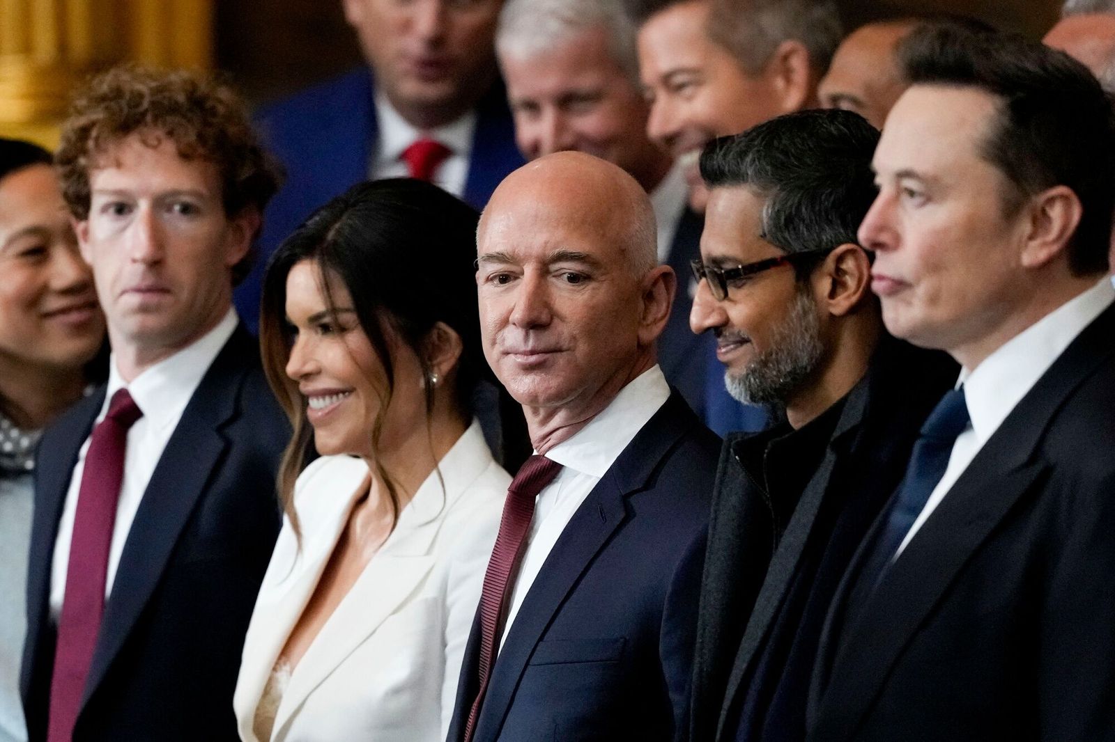 Mark Zuckerberg, chief executive officer of Meta Platforms Inc., from left, Lauren Sanchez, Jeff Bezos, founder of Amazon.com Inc., Sundar Pichai, chief executive officer of Alphabet Inc., and Elon Musk, chief executive officer of Tesla Inc., during the 60th presidential inauguration in the rotunda of the US Capitol in Washington, DC, US, on Monday, Jan. 20, 2025. Donald Trump's Monday swearing-in marks just the second time in US history that a president lost the office and managed to return to power - a comeback cementing his place within the Republican Party as an enduring, transformational figure rather than a one-term aberration. Photographer: Julia Demaree Nikhinson/AP Photo/Bloomberg