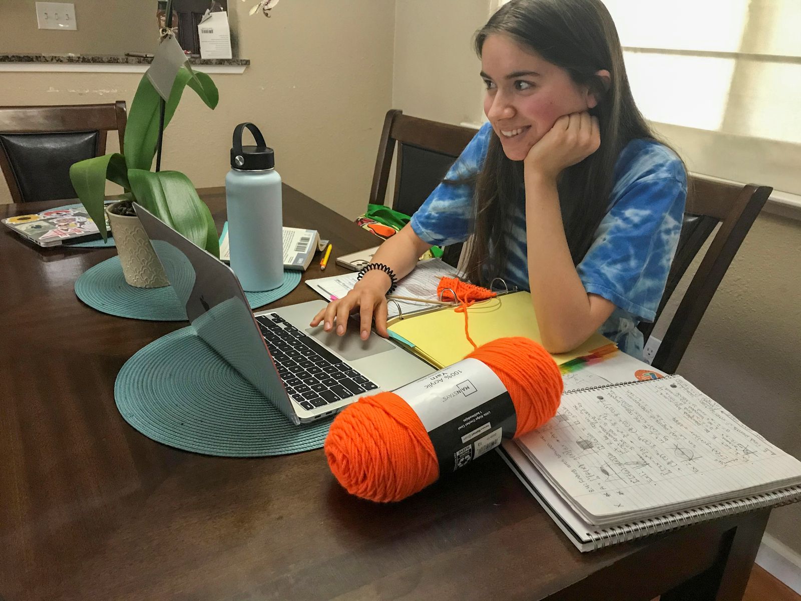 Zoe Isabella Rosales attends a medical careers class via Zoom at her home in Yuba City - REUTERS