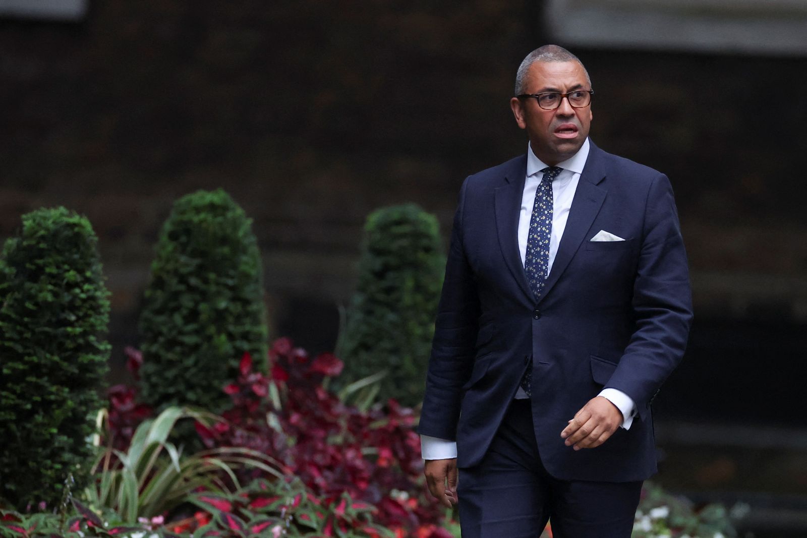 James Cleverly arrives at Number 10 Downing Street in London - REUTERS