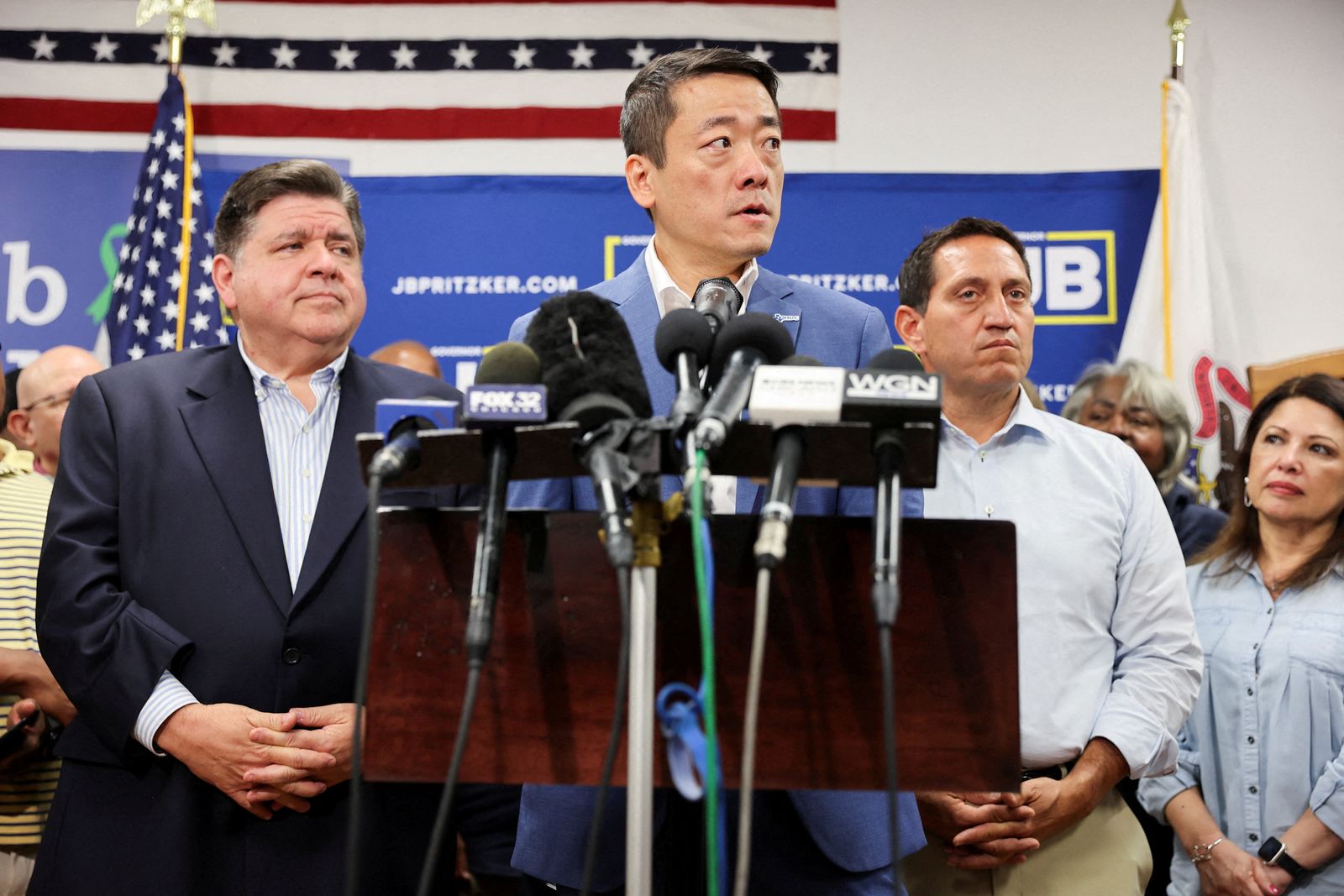 Texas State Rep. Gene Wu speaks near Texas State Rep. Trey Martinez and Illinois Governor J.B. Pritzker as Democratic lawmakers from Texas hold a press conference, after leaving their state to deny Republicans the quorum needed to redraw the state's 38 congressional districts, in Carol Stream, Illinois, U.S. August 3, 2025. REUTERS/Tom Krawczyk