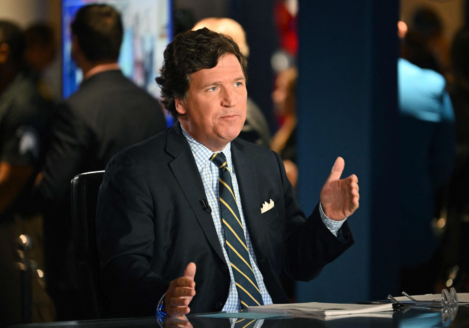 (FILES) In this file photo taken on November 17, 2022 Tucker Carlson speaks during 2022 FOX Nation Patriot Awards at Hard Rock Live at Seminole Hard Rock Hotel & Casino Hollywood in Hollywood, Florida. - Fox News star host Tucker Carlson is leaving the influential TV network, it was announced April 24, 2023, in a shock move days after the conservative outlet reached a $787.5 million settlement over a damaging defamation case. (Photo by Jason Koerner / GETTY IMAGES NORTH AMERICA / AFP) - AFP