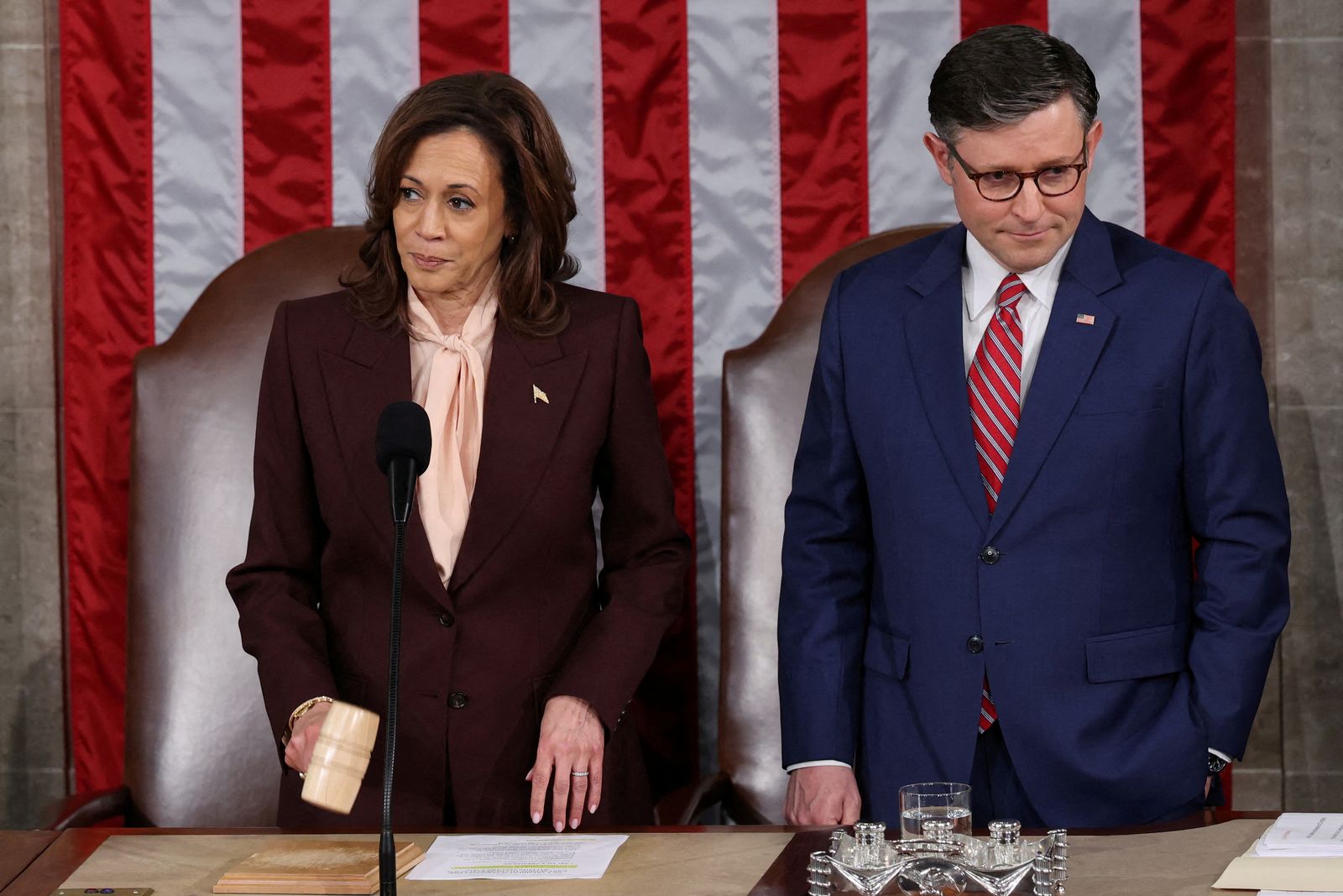 U.S. Vice President Kamala Harris affirms the certification of Donald Trump's election, next to Speaker of the House Mike Johnson (R-LA), during a joint session of Congress to certify Trump's election, at the U.S. Capitol in Washington, U.S. January 6, 2025. REUTERS/Evelyn Hockstein