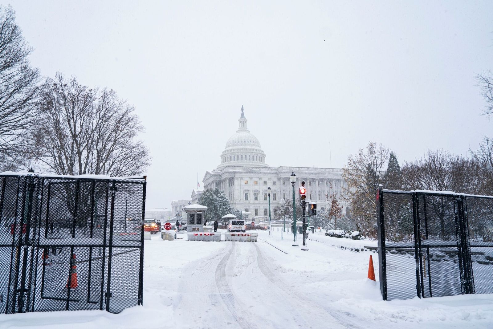 Security fencing outside the US Capitol in Washington, DC, US, on Monday, Jan. 6, 2025. Snow is piling up in Washington, shutting down federal offices and schools, as a winter storm that has snarled air and road traffic and knocked out power in six states makes its way east. Photographer: Al Drago/Bloomberg