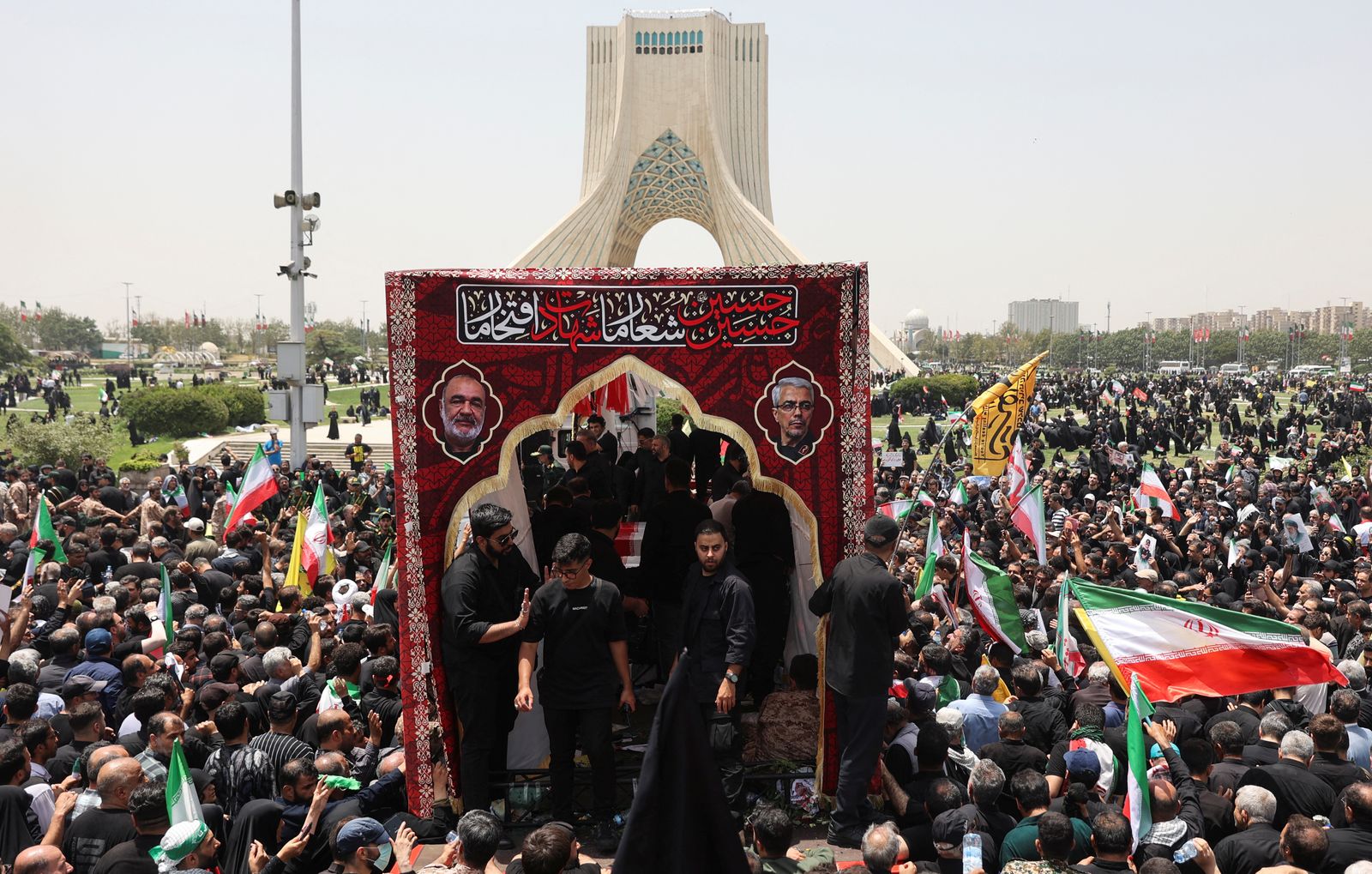 People attend the funeral procession of Iranian military commanders, nuclear scientists and others killed in Israeli strikes, in Tehran, Iran, June 28, 2025. Majid Asgaripour/WANA (West Asia News Agency) via REUTERS   ATTENTION EDITORS - THIS PICTURE WAS PROVIDED BY A THIRD PARTY
