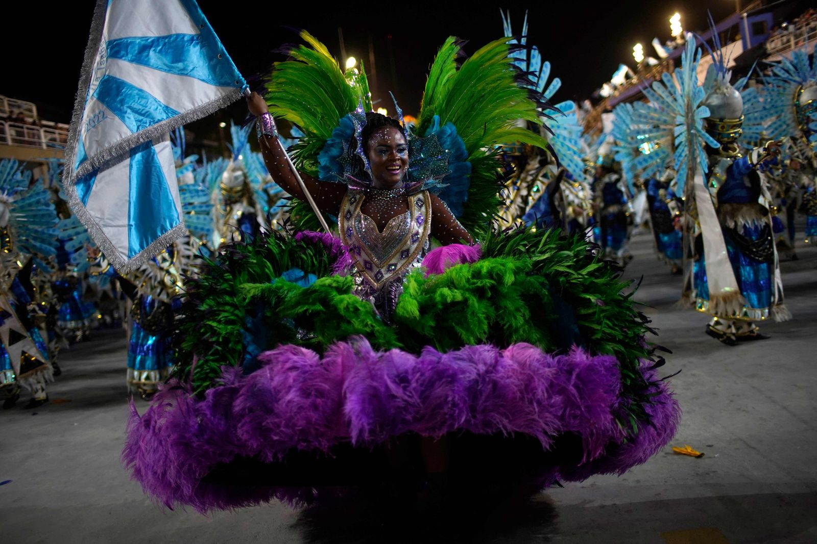 Members of Vila Isabel samba school perform during the second night of Rio's Carnival parade at the Sambadrome Marques de Sapucai in Rio de Janeiro on April 24, 2022. (Photo by Mauro PIMENTEL / AFP) - AFP