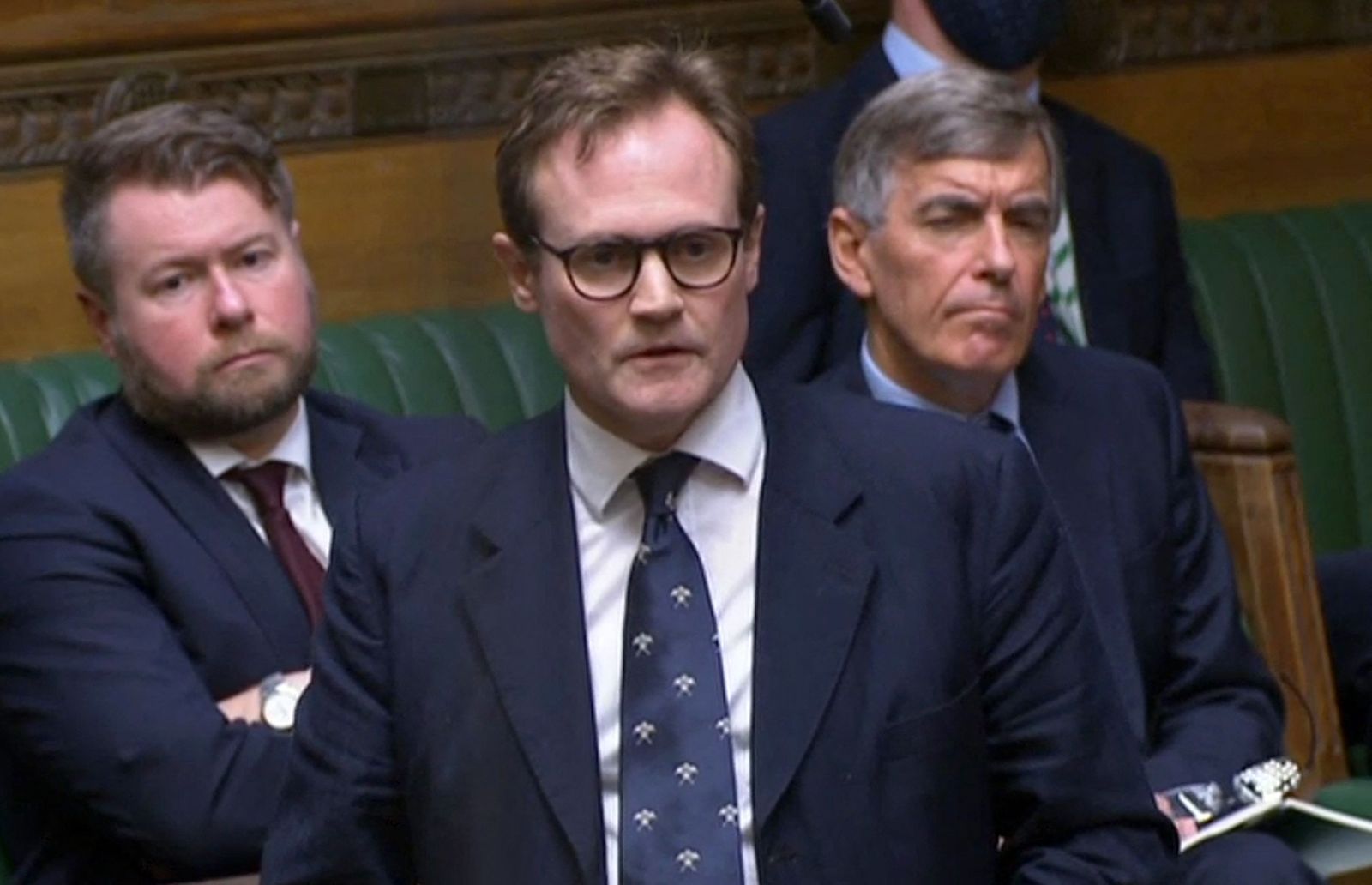 (FILES) In this  ideo grab from footage broadcast by the UK Parliament's Parliamentary Recording Unit (PRU) taken on August 18, 2021 Conservative MP for Tonbridge and Malling, Tom Tugendhat, speaks during an extraordinary session of parliament called to discuss the collapse of the Afghan government in the House of Commons in London. - While Moscow is amassing troops in a show of force on the Ukrainian border, Russian money is infiltrating the British economy and contributing to geopolitical destabilization in Europe, says Tom Tugendhat, chairman of Britain's Parliamentary Foreign Affairs Committee. (Photo by PRU / AFP) / RESTRICTED TO EDITORIAL USE - MANDATORY CREDIT 