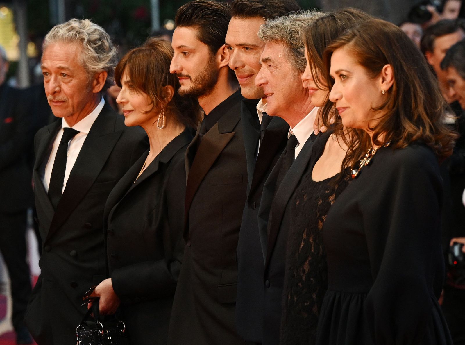 (From L) French actor Nicolas Briancon, Italian actress Laura Morante, French actor Pierre Niney, French director Nicolas Bedos, French actor Francois Cluzet, French actress Marine Vacth and French actress Emmanuelle Devos arrive for the screening of the film 