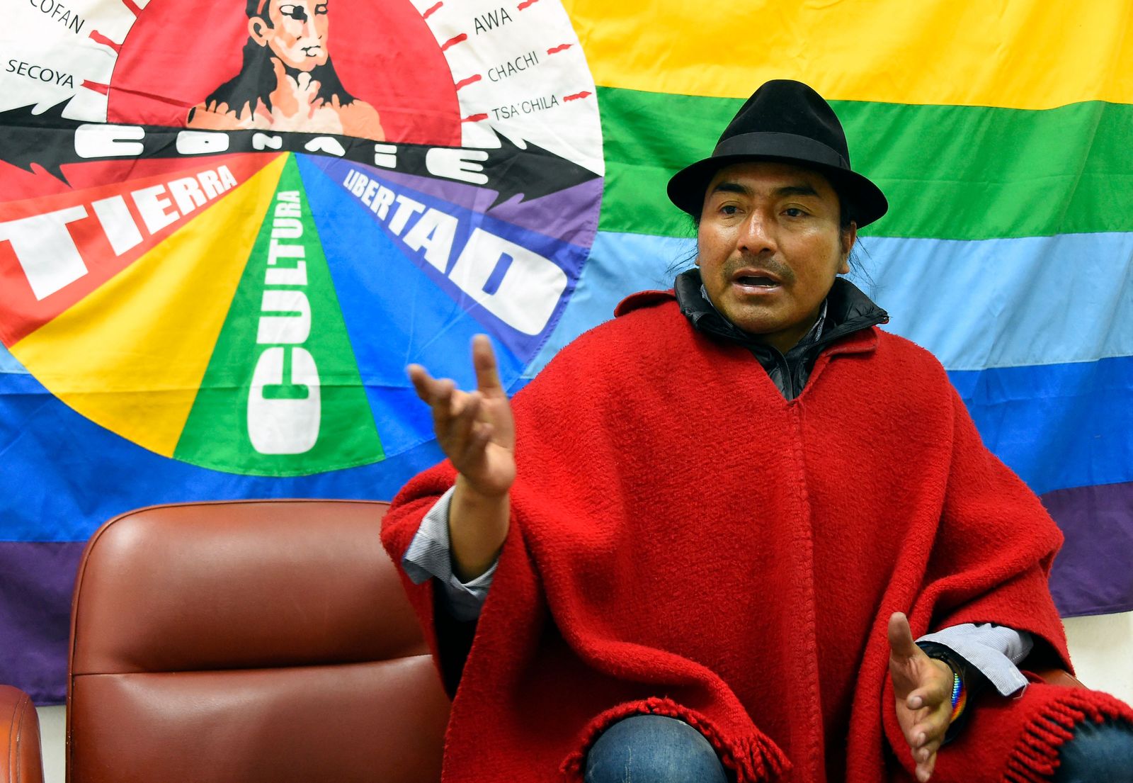 The leader of the Confederation of Indigenous Nationalities of Ecuador (CONAIE) Leonidas Iza speaks during an interview at the Agora of the Ecuadorean House of Culture, in Quito, on June 23, 2022. - Iza, who forged his leadership among the indigenous people through protests, is back in Quito at the forefront of a massive mobilisation of the whoe country that has conservative President Guillermo Lasso on the ropes. (Photo by Rodrigo BUENDIA / AFP) - AFP