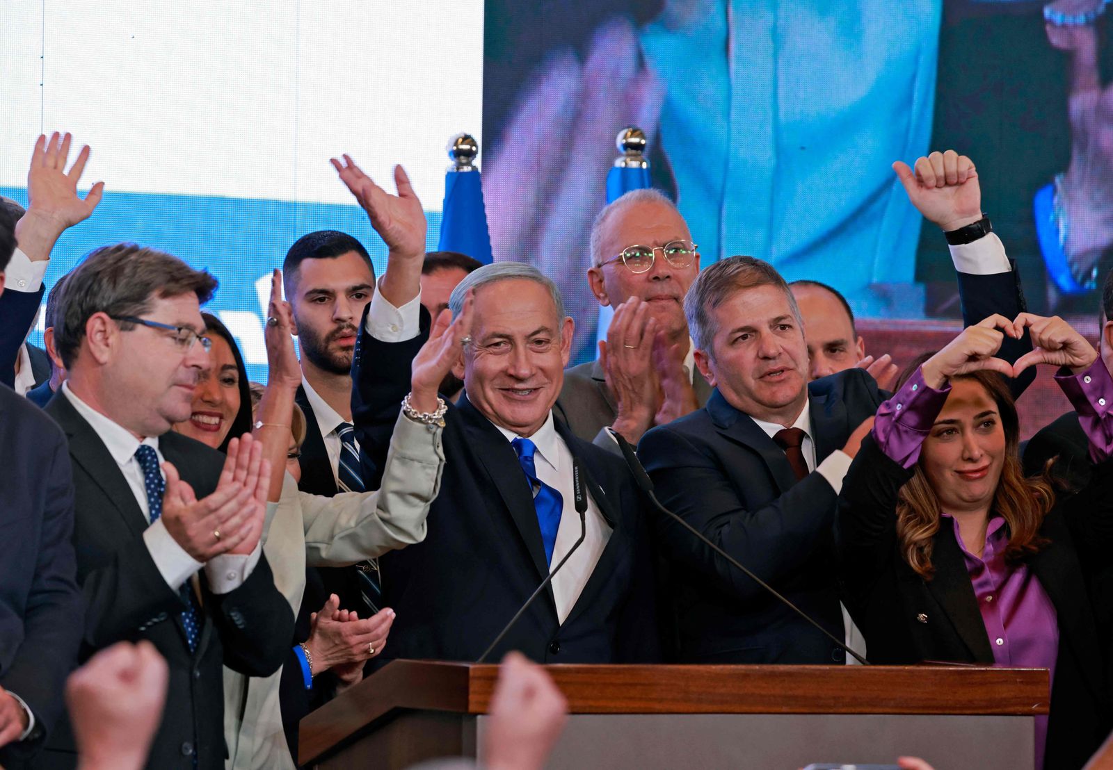 Israel's ex-premier and leader of the Likud party Benjamin Netanyahu addresses supporters at campaign headquarters in Jerusalem early on November 2, 2022, after the end of voting for national elections. - Netanyahu inched towards reclaiming power after projected election results showed a majority government was within reach for the veteran right-winger, but the outlook could shift as ballots are counted. (Photo by Menahem KAHANA / AFP) - AFP