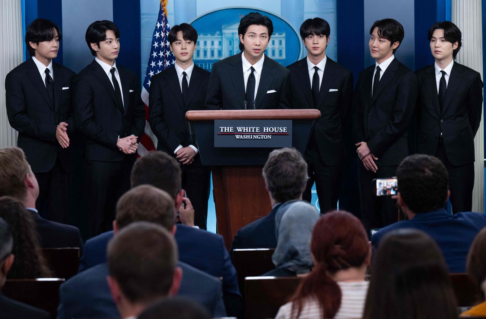 (FILES) In this file photo taken on May 31, 2022 Korean band BTS appears at the daily press briefing in the Brady Press Briefing of the White House in Washington, DC, as they visit to discuss Asian inclusion and representation, and addressing anti-Asian hate crimes and discrimination. - K-pop supergroup BTS on June 14, 2022 announced they were taking an indefinite 
