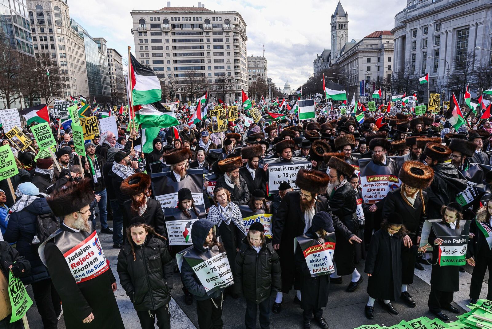 Pro-Palestinian demonstrators, including members of Neturei Karta, an international anti-Zionist and ultra-Orthodox Haredi Jewish group, during the March on Washington for Gaza rally in Washington, DC, US, on Saturday, Jan. 13, 2024. South Africa called on the United Nations' International Court of Justice to order Israel to end its war on Hamas in the Palestinian territory of Gaza and rule that its military actions constitute genocide. Photographer: Valerie Plesch/Bloomberg