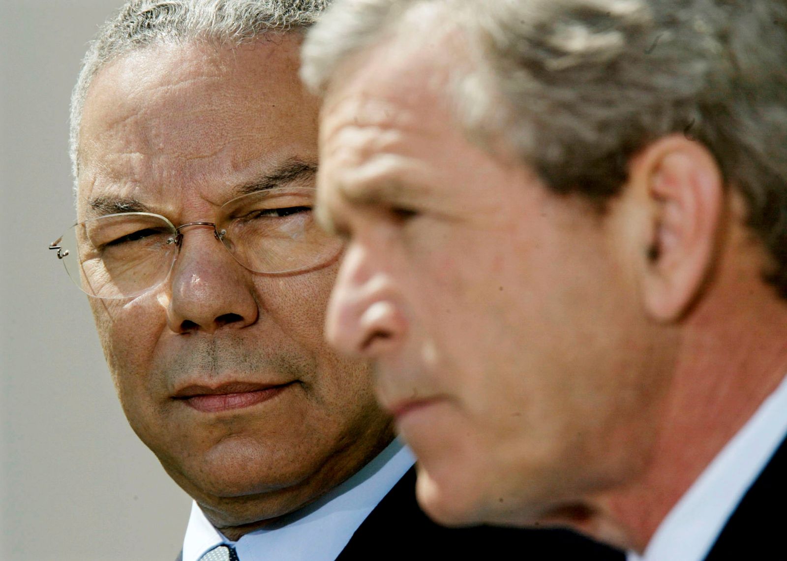 FILE PHOTO: BUSH SPEAKS ABOUT THE MIDEAST AS POWELL STANDS AT HIS SIDE. - REUTERS