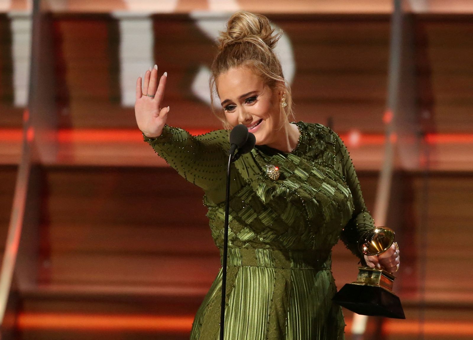 FILE PHOTO: Adele and co-song writer Kurstin accept the Grammy for Song of the Year for 