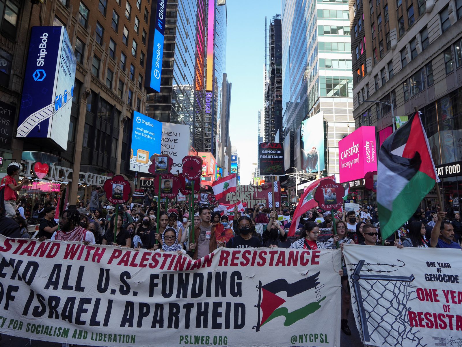 People walk in demonstration, nearly one year after Hamas' October 7, 2023 attack in southern Israel, in New York City, U.S., October 5, 2024. REUTERS/Stephani Spindel