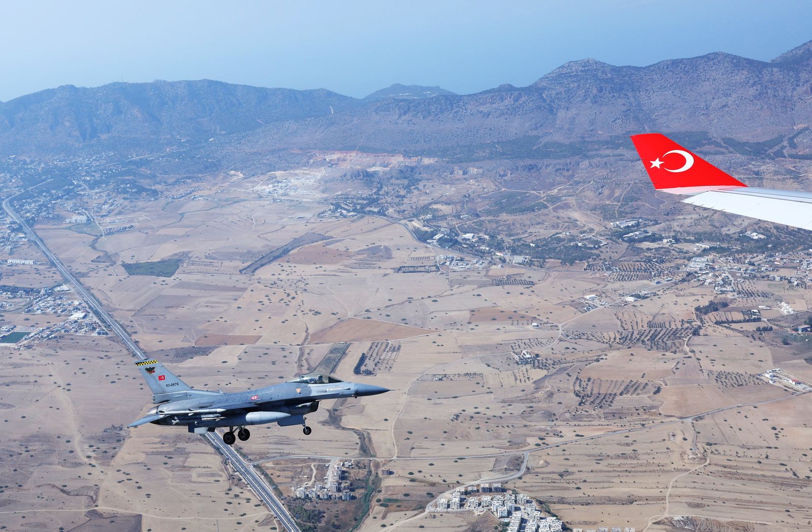 A Turkish Air Force F16 fighter jet escorts a private plane carrying Turkish President Tayyip Erdogan before landing at Ercan Airport in the Turkish-controlled part of Nicosia, Cyprus, July 20, 2025. Mustafa Kamaci/Turkish Presidential Press Office/Handout via REUTERS ATTENTION EDITORS - THIS PICTURE WAS PROVIDED BY A THIRD PARTY. NO RESALES. NO ARCHIVES.
