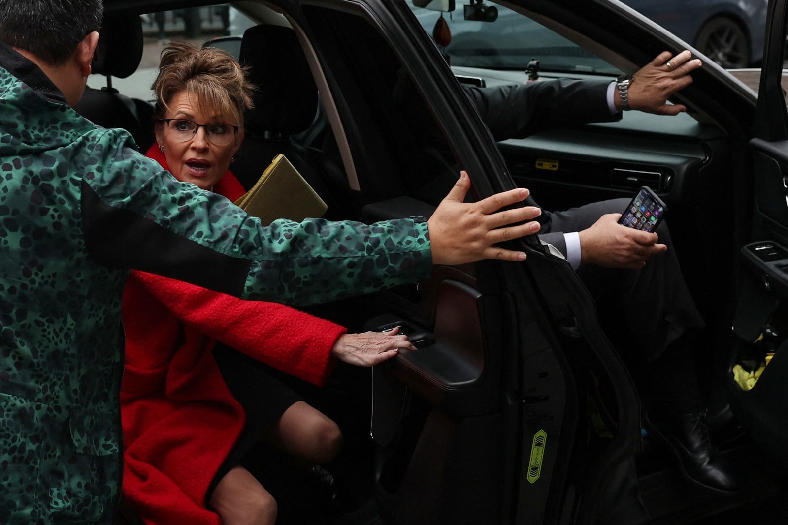 Sarah Palin arrives for her retrial lawsuit accusing the New York Times of defaming the former Alaska governor and Republican U.S. vice presidential candidate in an editorial, outside Manhattan federal court in New York City, U.S., April 15, 2025. REUTERS/Shannon Stapleton