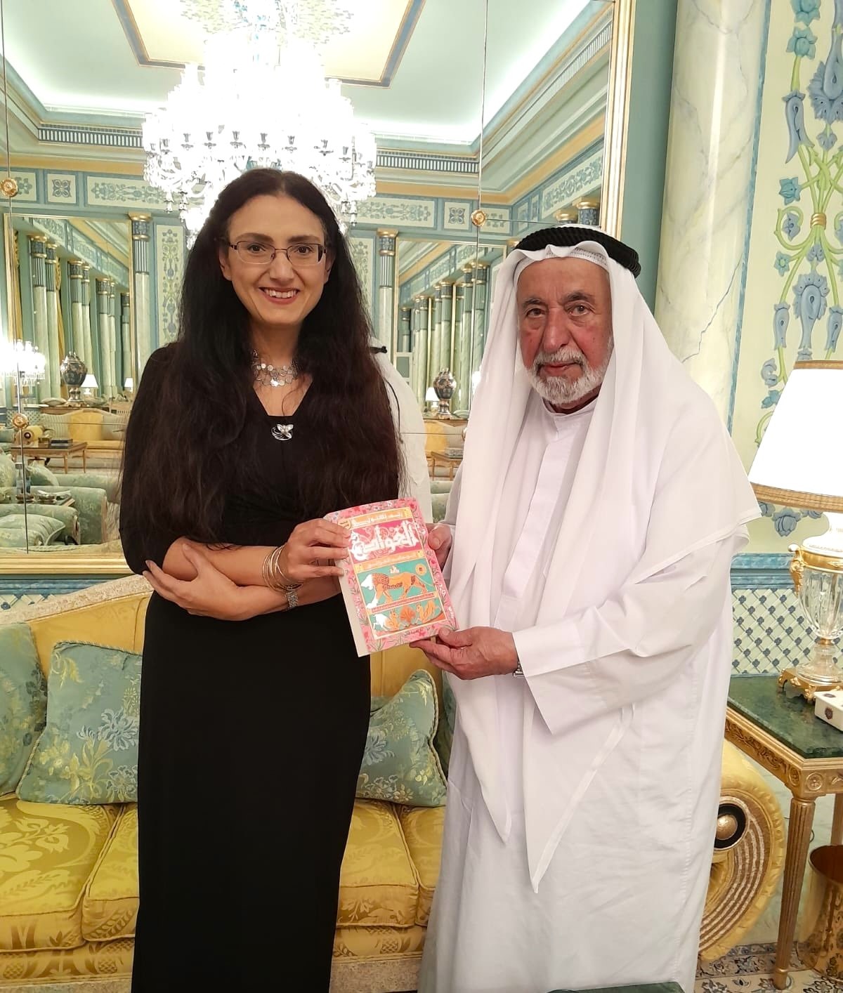 ريم بسيوني إلى جانب حاكم الشارقة