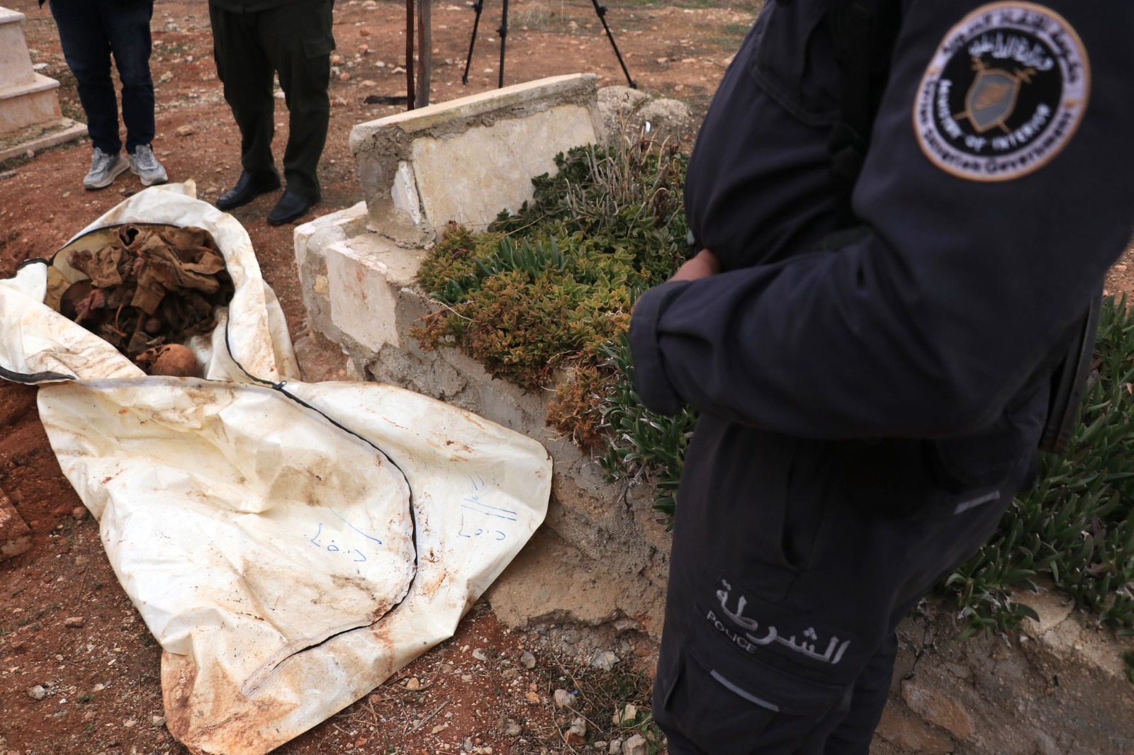 ALEPPO, SYRIA - JANUARY 5: A mass grave containing remains believed to belong to civilians killed by the Bashar Assad regime is uncovered in the village of Naqqarin in Syria's Aleppo province on January 5, 2025. The discovery revealed skeletal remains thought to belong to victims of the ousted regime. (Photo by Velit El Idlibi/Anadolu via Getty Images)