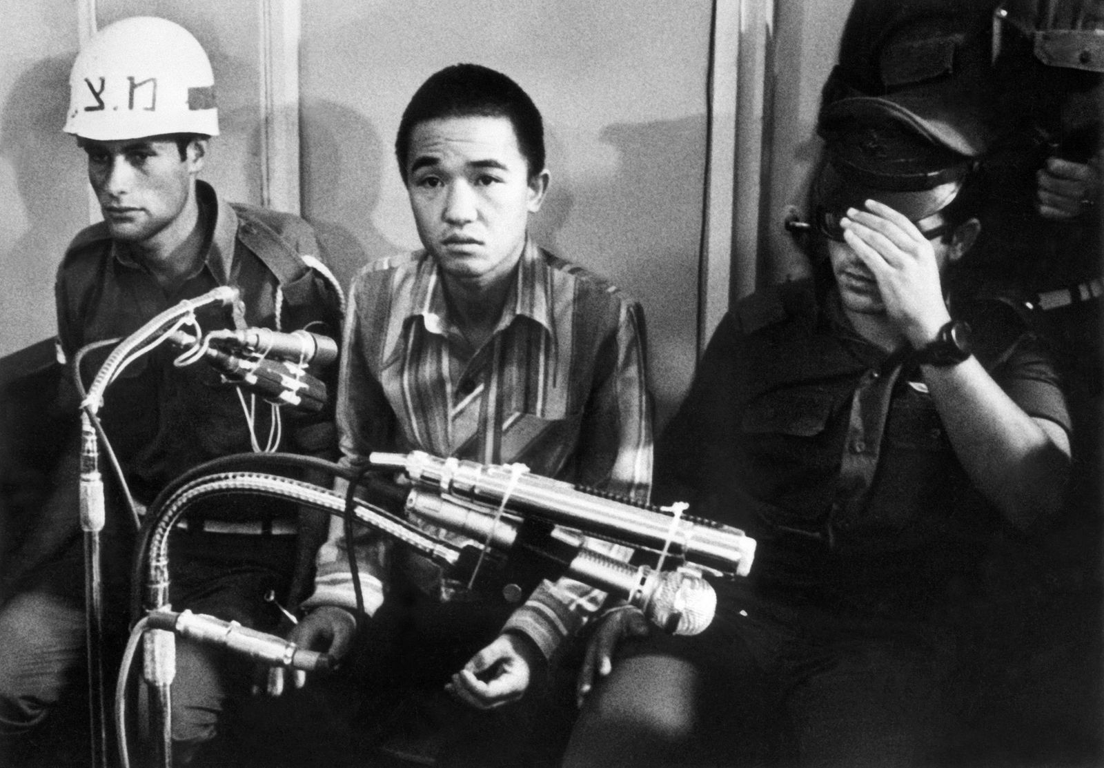 (FILES) This file photo taken 10 July 1972 shows Kozo Okamoto (C) -- the only surviving member of the three-man 