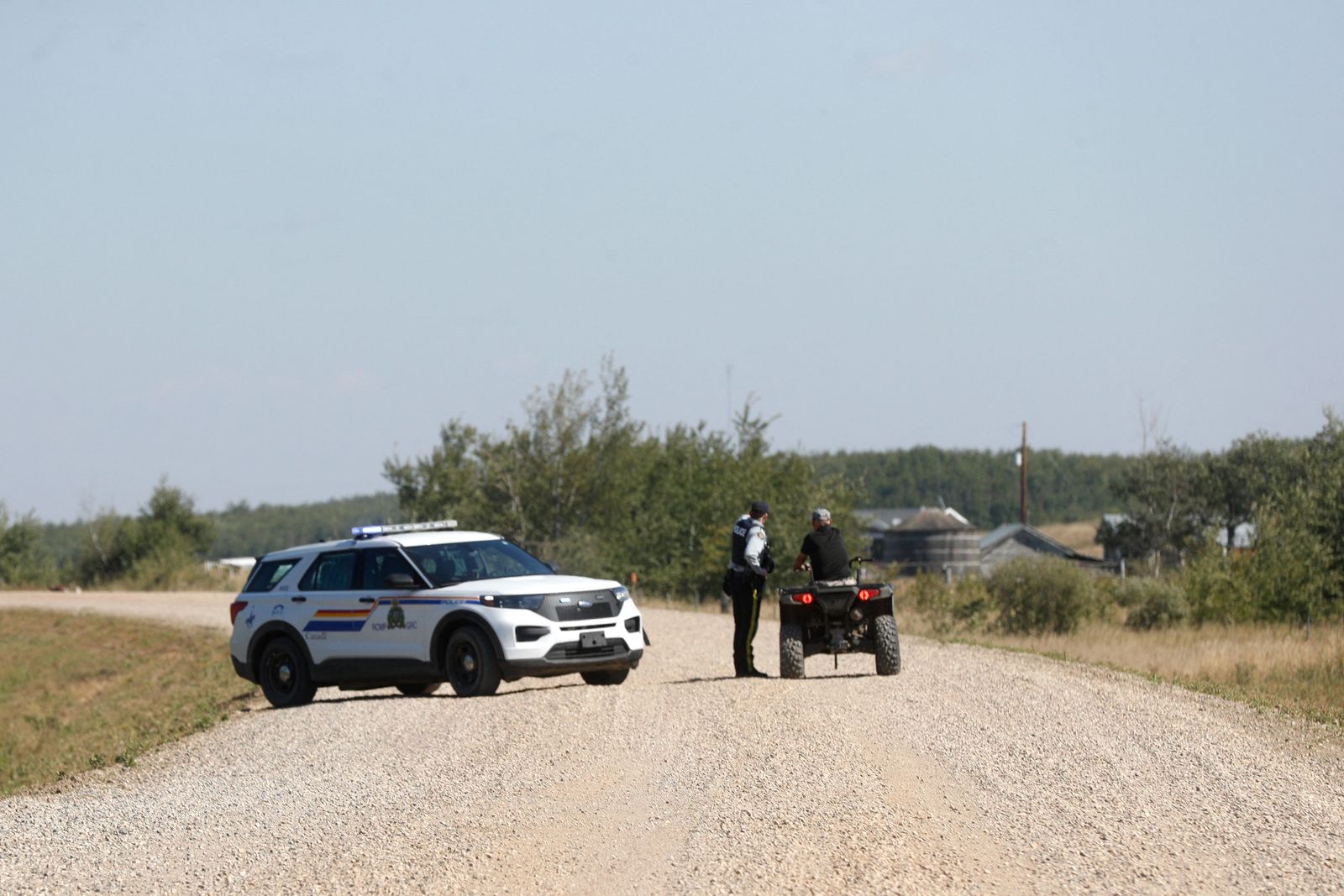 Police deal with a situation following a possible sighting of the second person of interest in the stabbings that occurred at the James Smith Cree Nation Indigenous community and the town of Weldon, near the James Smith Cree Nation Indigenous community in Canada on September 6, 2022. - One of two brothers who were the target of a massive manhunt in Canada after allegedly carrying out a stabbing spree that left 10 dead and 18 wounded has been found dead, police said on September 5, 2022. The killings in the remote James Smith Cree Nation Indigenous community and the town of Weldon in Saskatchewan province in western Canada are among the deadliest incidents of mass violence to ever hit the nation. (Photo by LARS HAGBERG / AFP) - AFP