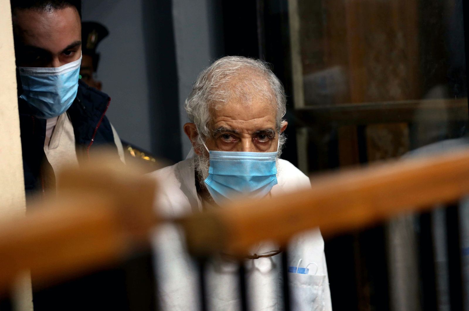 A picture taken on December 10, 2020 shows Mahmud Ezzat, the Muslim brotherhood group acting leader, during his first session in his trial at the police institute at Torah prison in Cairo. - Egypt on Auguts 28, 2020 arrested the top leader of the Muslim Brotherhood, the latest swept up by Cairo's long-running crackdown against the outlawed Islamist group, the interior ministry said. Ezzat, the group's acting leader, has already been handed two death sentences in absentia, as well as life imprisonment. (Photo by Khaled KAMEL / AFP) - AFP