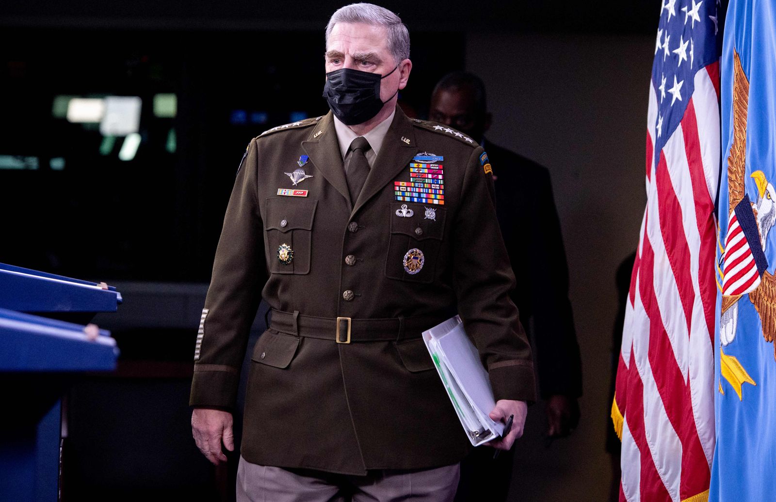 (FILES) In this file photo taken on September 01, 2021 US Army General Mark Milley, Chairman of the Joint Chiefs of Staff, arrives for a press briefing about the US military drawdown in Afghanistan, at the Pentagon in Washington, DC. - The Pentagon's top general was so worried in early January that president Donald Trump was out of control that he took secret action to prevent Trump from sparking a war with China, according to a new book. (Photo by SAUL LOEB / AFP) - AFP