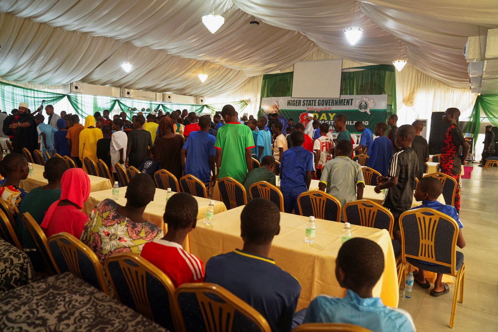 Rescued schoolchildren from St. Mary's School gather at the Niger State Government House after being freed from captivity following their abduction by gunmen, in Minna, Nigeria, December 8, 2025. REUTERS/Marvellous Durowaiye