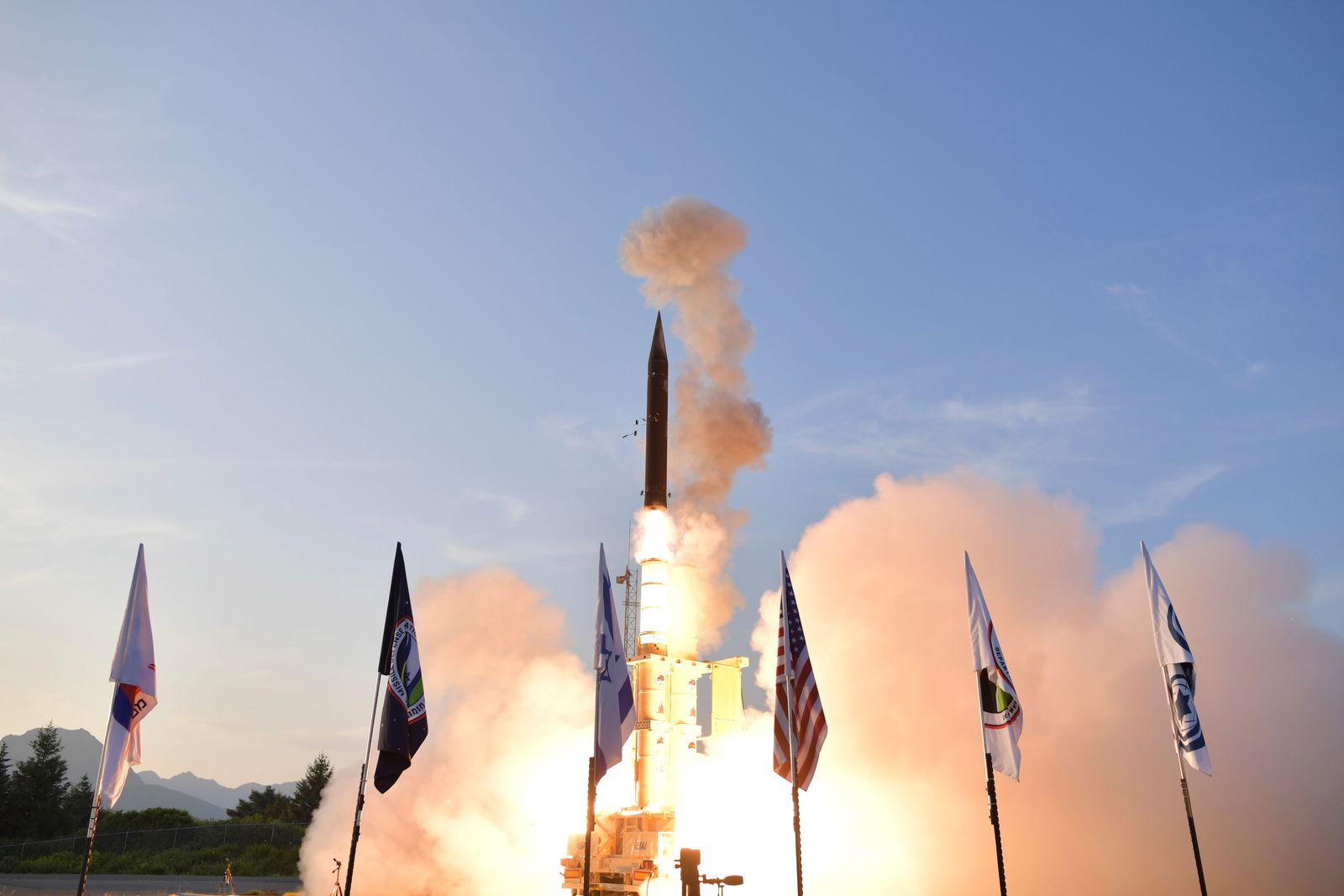 (FILES) A handout picture released by the Israeli Ministry of Defence on July 28, 2019 shows the launch of the Arrow-3 hypersonic anti-ballistic missile at an undisclosed location in Alaska. The Arrow 3 system -- designed to shoot down ballistic missiles above the Earth's atmosphere -- is jointly developed and produced by Israel and the United States. (Photo by Israeli Ministry of Defence / AFP) / == RESTRICTED TO EDITORIAL USE - MANDATORY CREDIT 'AFP PHOTO / HO / ISRAELI MINISTRY OF DEFENCE' - NO MARKETING NO ADVERTISING CAMPAIGNS - DISTRIBUTED AS A SERVICE TO CLIENTS ==