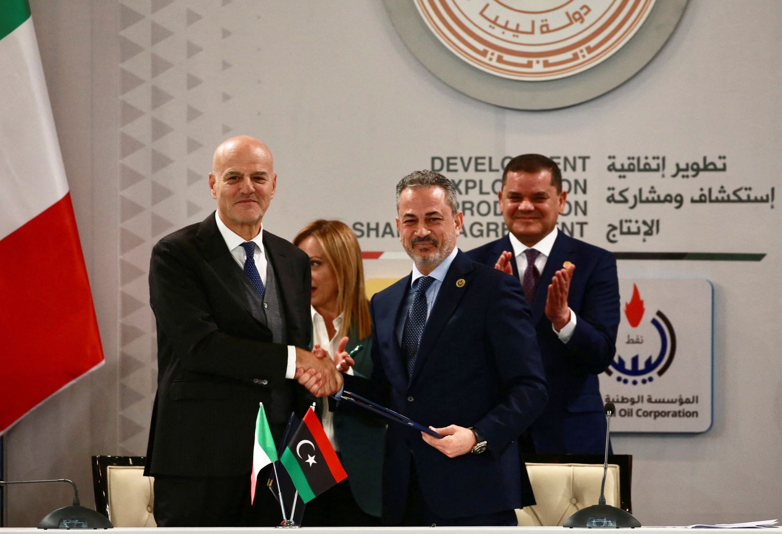 Eni Chief Executive Officer Claudio Descalzi and NOC head Farhat Bengdara attend an event to sign an agreement between the two companies in Tripoli - REUTERS