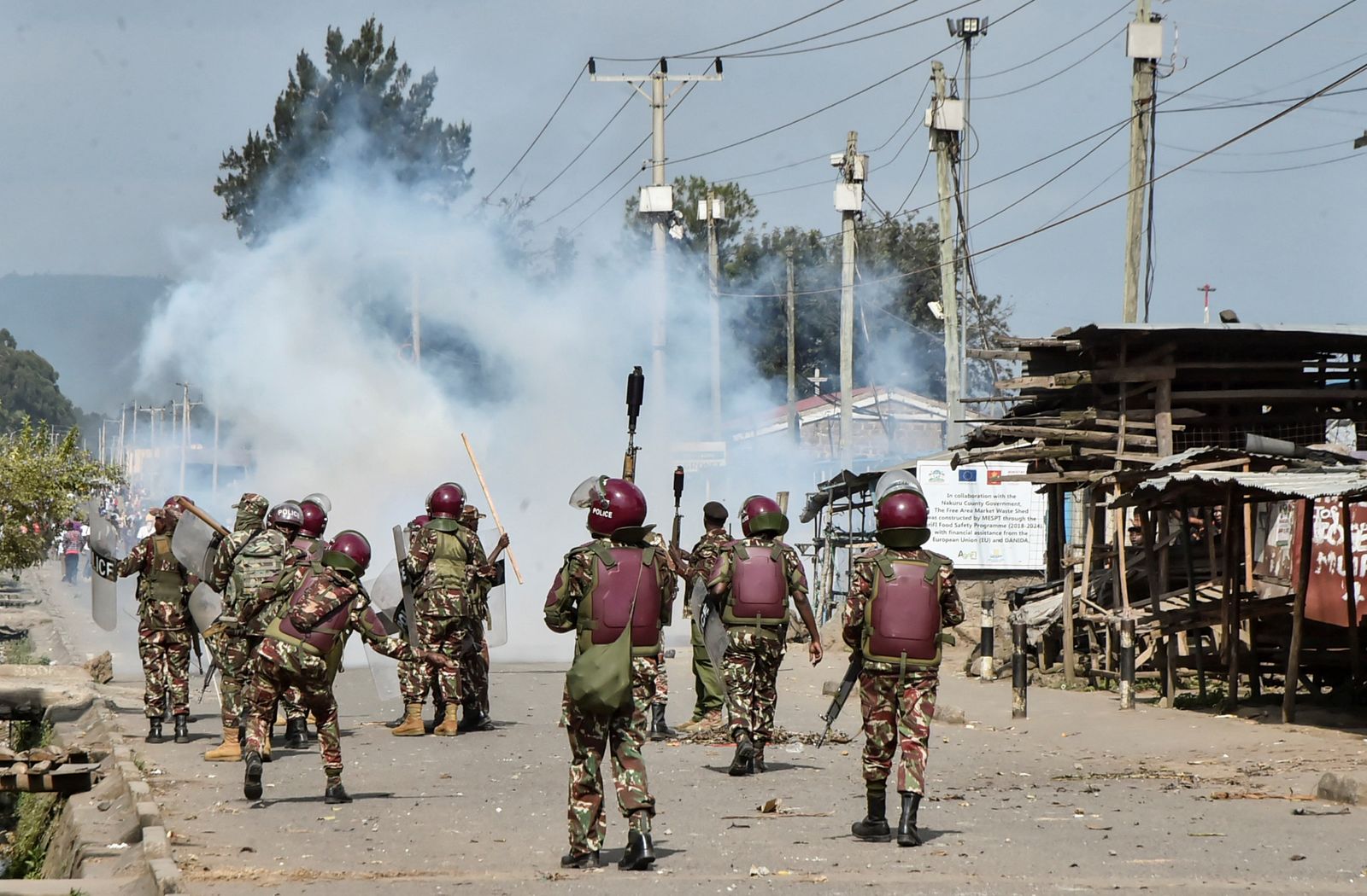 Riot police officers fire tear gas canisters to disperse demonstrators during anti-government protests dubbed 'Saba Saba People's March', in the Rift Valley town of Nakuru, Kenya July 7, 2025. REUTERS/Suleiman Mbatiah