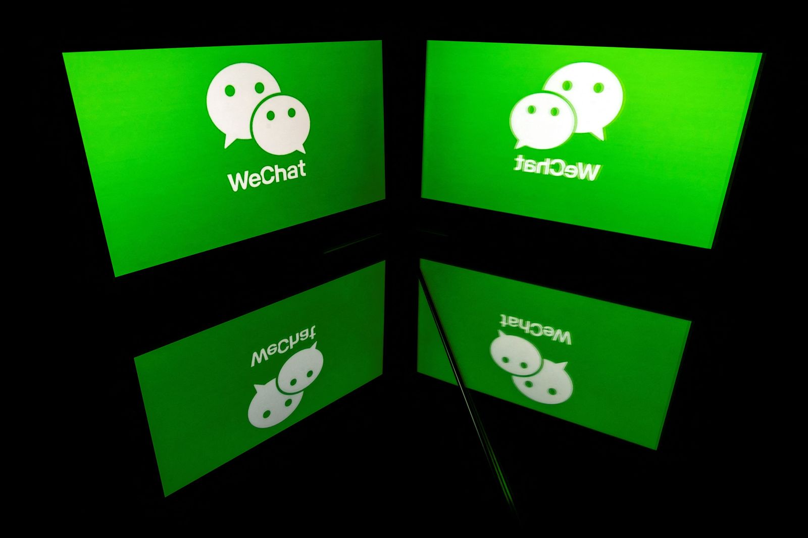 (FILES) This file picture taken on October 5, 2020 shows the logo of mobile messaging service WeChat on the screen of a tablet in Toulouse, southwestern France. - Stripe, SumUp or Pledg... These young companies, little known to the general public, are already worth a fortune, and for good reason: as payment specialists, they are taking full advantage of the boost given to e-commerce by the Covid-19 crisis. (Photo by Lionel BONAVENTURE / AFP) - AFP