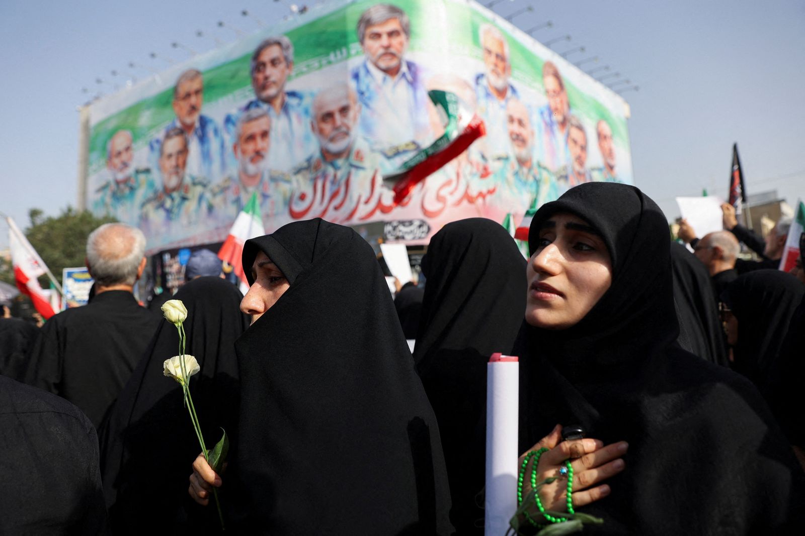 People attend the funeral procession of Iranian military commanders, nuclear scientists and others killed in Israeli strikes, in Tehran, Iran, June 28, 2025. Majid Asgaripour/WANA (West Asia News Agency) via REUTERS   ATTENTION EDITORS - THIS PICTURE WAS PROVIDED BY A THIRD PARTY