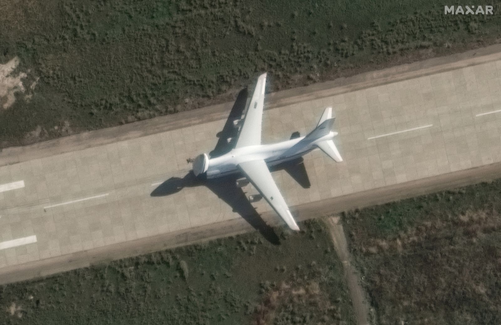 A satellite image shows an An-124 heavy transport aircraft with its nose cone lifted, at the Russian Khmeimim airbase, near Latakia, Syria, December 13, 2024. Maxar Technologies/Handout via REUTERS  THIS IMAGE HAS BEEN SUPPLIED BY A THIRD PARTY. NO RESALES. NO ARCHIVES. MUST NOT OBSCURE LOGO. MANDATORY CREDIT