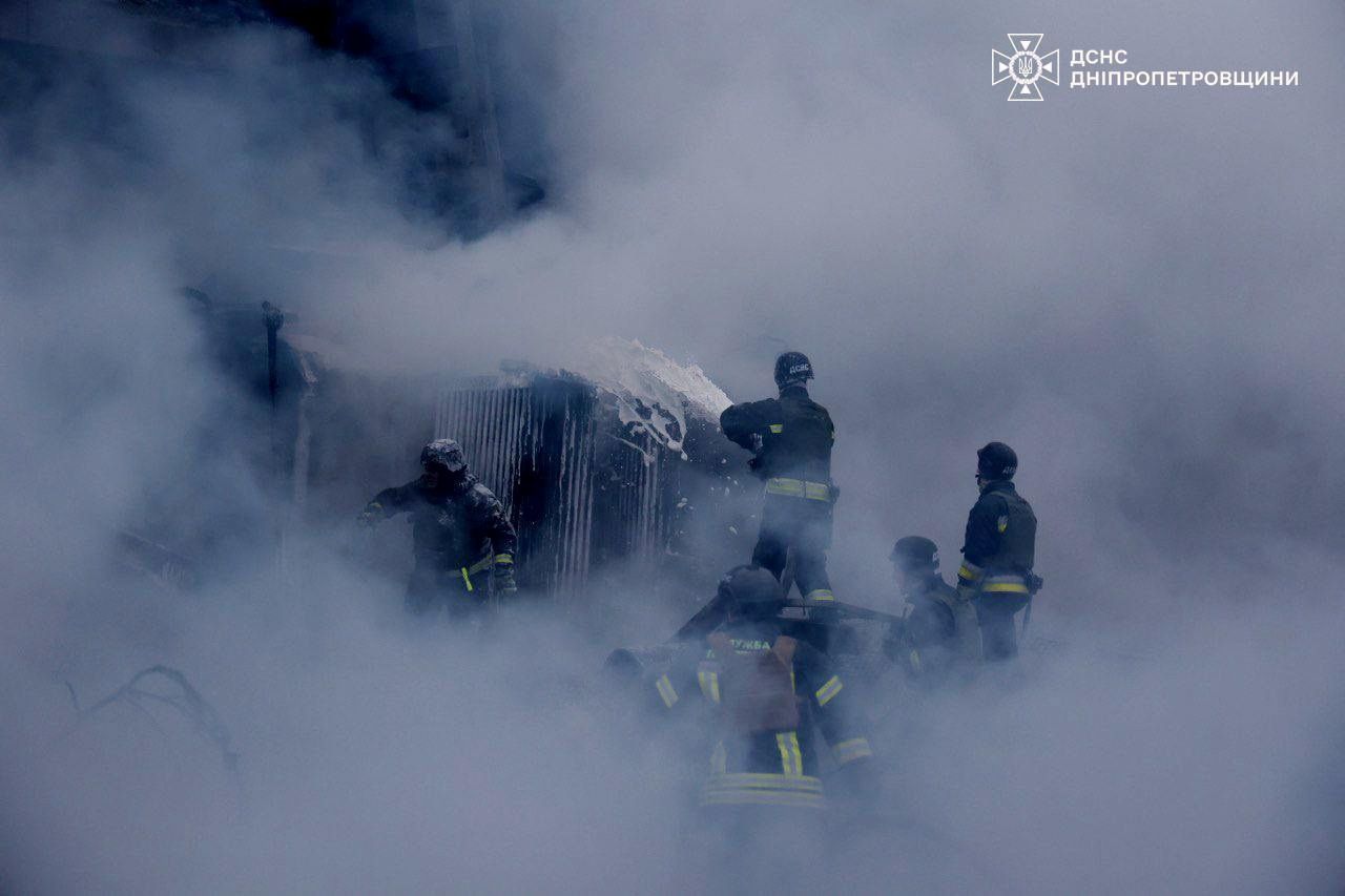 Firefighters work at a site of a Russian missile strike, amid Russia's attack on Ukraine, in Dnipropetrovsk region, Ukraine December 25, 2024.  Press service of the State Emergency Service of Ukraine in Dnipropetrovsk region/Handout via REUTERS ATTENTION EDITORS - THIS IMAGE HAS BEEN SUPPLIED BY A THIRD PARTY. WATERMARK FROM SOURCE.