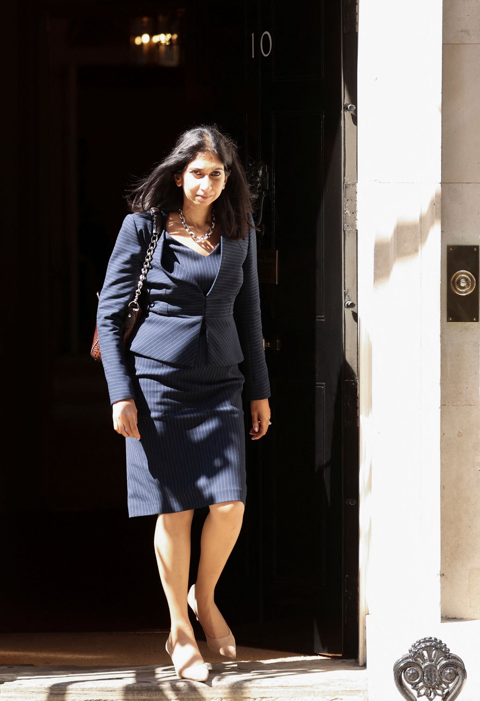 British Attorney General Suella Braverman walks outside at Downing Street in London, Britain, July 7, 2022. REUTERS/Phil Noble - REUTERS