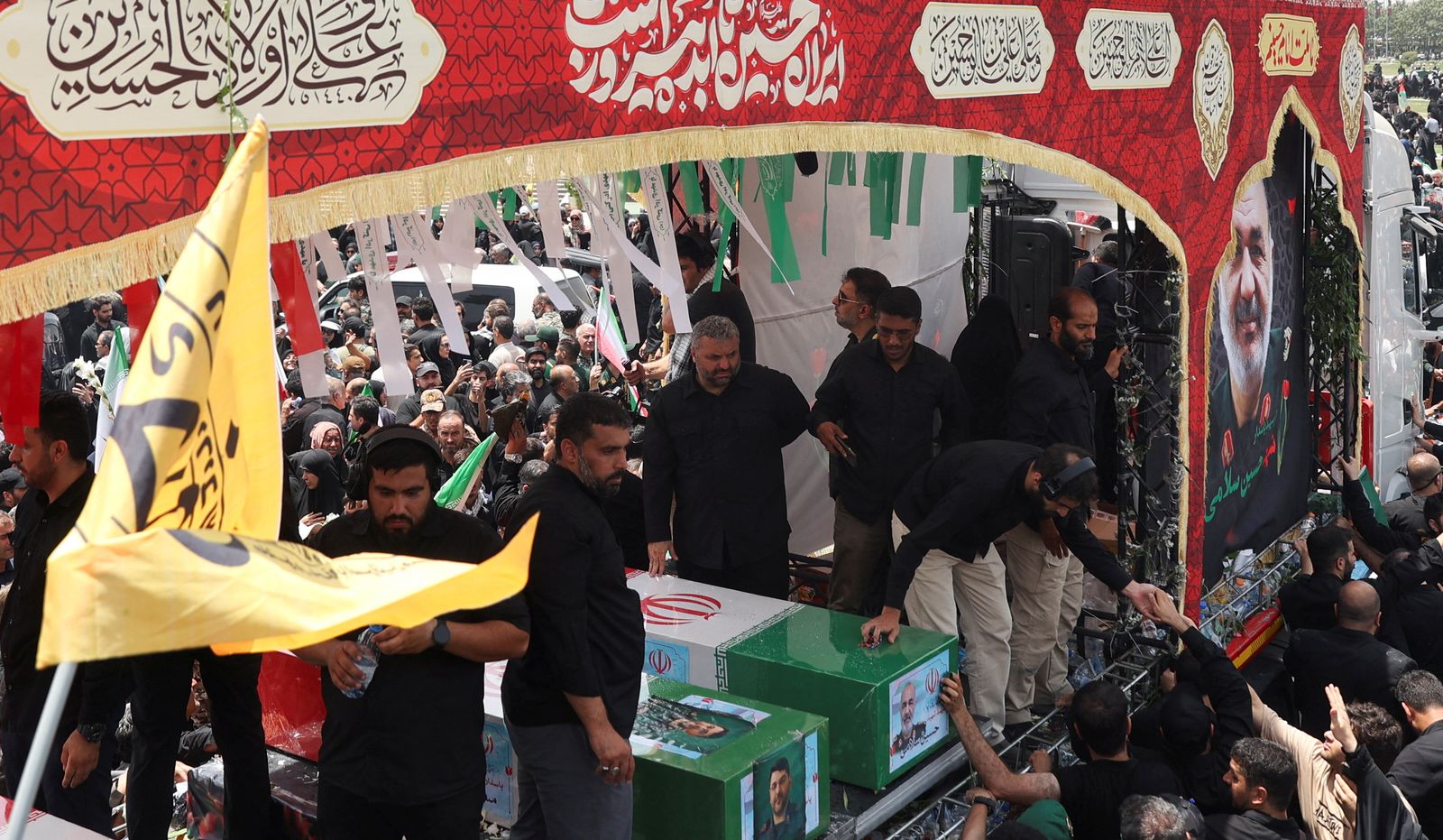People attend the funeral procession of Iranian military commanders, nuclear scientists and others killed in Israeli strikes, in Tehran, Iran, June 28, 2025. Majid Asgaripour/WANA (West Asia News Agency) via REUTERS   ATTENTION EDITORS - THIS PICTURE WAS PROVIDED BY A THIRD PARTY