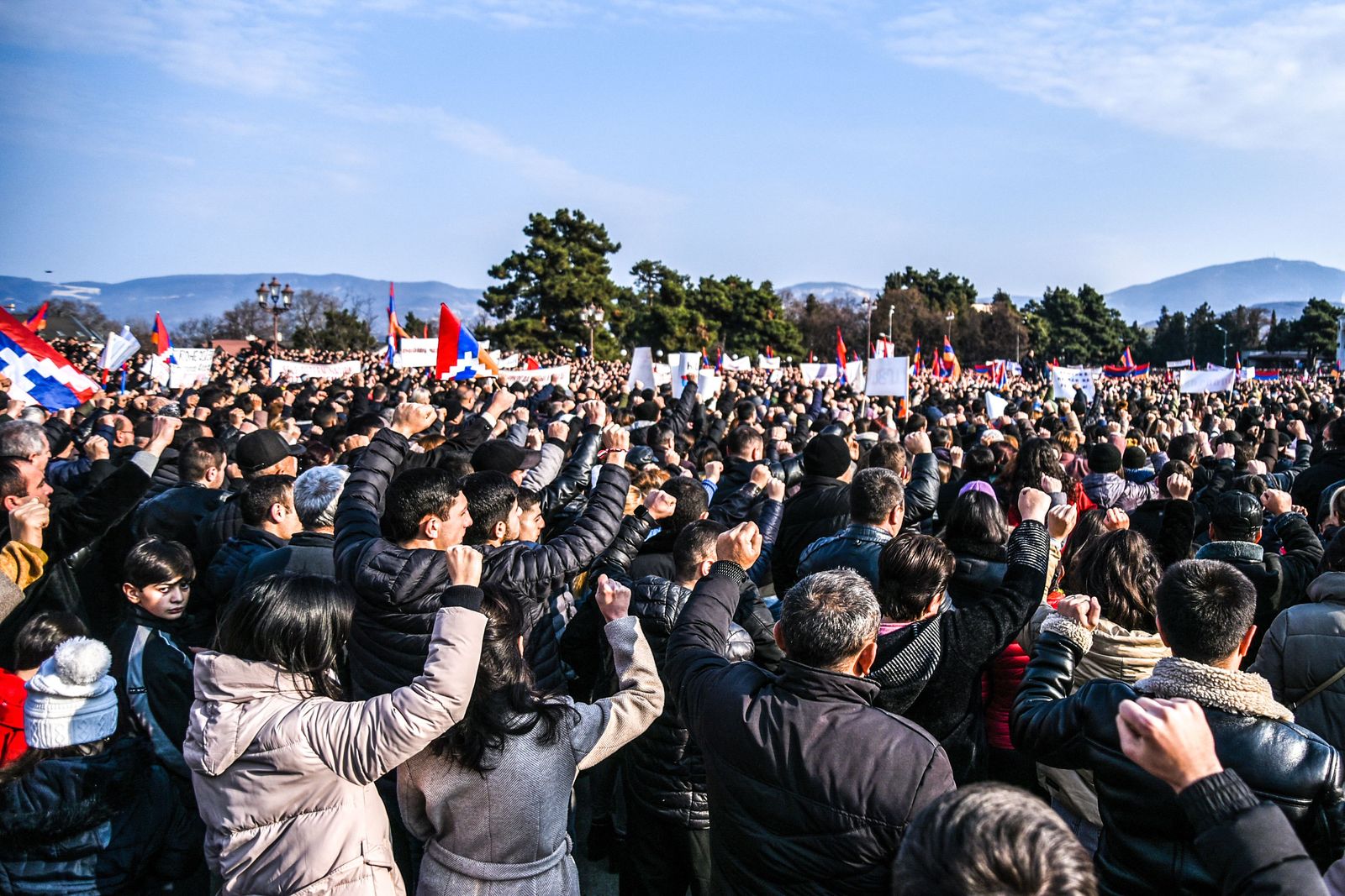 Protesters attend a rally in Stepanakert, capital of the self-proclaimed Nagorno-Karabakh region of Azerbaijan, on December 25, 2022. - Thousands rally in Nagorno-Karabakh to protest blockade of only land link to Armenia. Russia's Foreign Minister Sergei Lavrov on December 23, 2022 called for de-escalation in Azerbaijan's Armenian-populated Nagorno-Karabakh, a region which has sparked two wars between the Caucasus neighbours. (Photo by Davit GHAHRAMANYAN / AFP) - AFP
