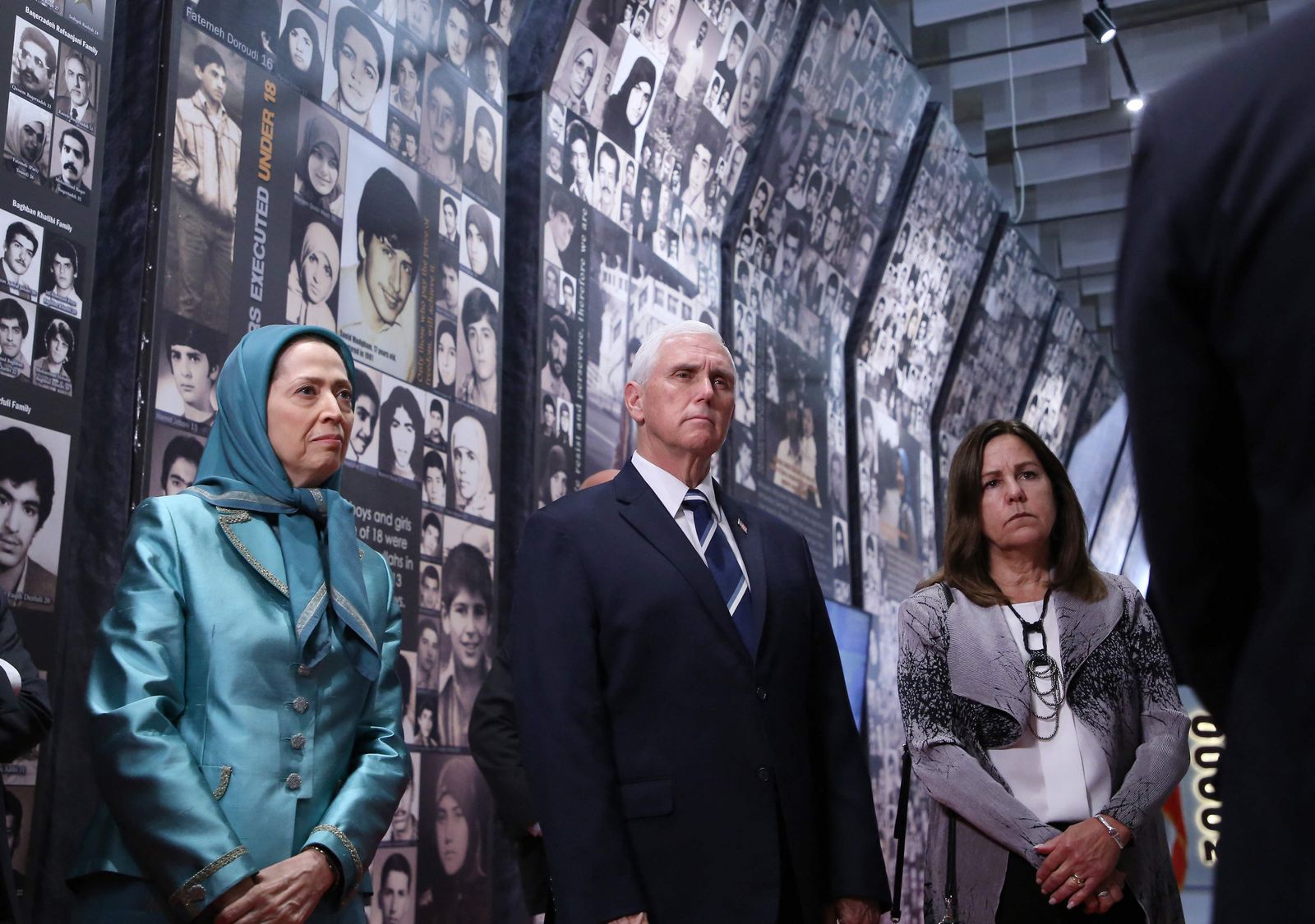 Leader of the People's Mujahedin of Iran Maryam Rajavi (L), former US Vice President  Mike Pence (C) and his wife Karen Pence (R) visit an exhibition inside of Ashraf-3 camp,  a base for the People's Mojahedin Organization of Iran (MEK) in the Albanian town of Manza, on June 23, 2022. (Photo by Gent SHKULLAKU / AFP) - AFP