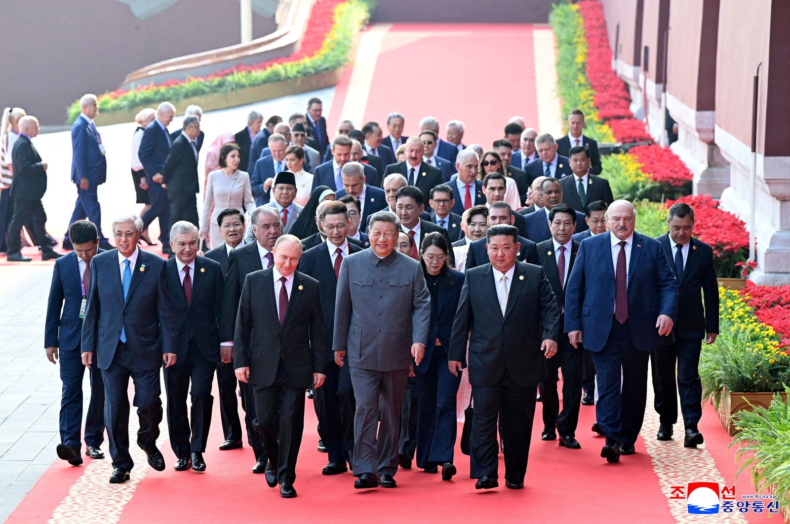 North Korean leader Kim Jong Un and Russian President Vladimir Putin walk with Chinese President Xi Jinping as they attend a military parade marking the 80th anniversary of the end of World War Two, in Beijing, China, September 3, 2025, in this picture released by the Korean Central News Agency.  KCNA via REUTERS    ATTENTION EDITORS - THIS IMAGE WAS PROVIDED BY A THIRD PARTY. REUTERS IS UNABLE TO INDEPENDENTLY VERIFY THIS IMAGE. NO THIRD PARTY SALES. SOUTH KOREA OUT. NO COMMERCIAL OR EDITORIAL SALES IN SOUTH KOREA.