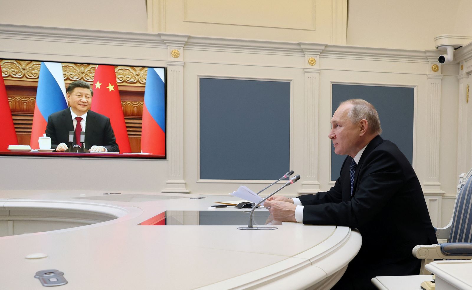 الرئيس الروسي فلاديمير بوتين يجري محادثات مع نظيره الصيني شي جين بينج عبر الفيديو، 30 ديسمبر 2022 - via REUTERS