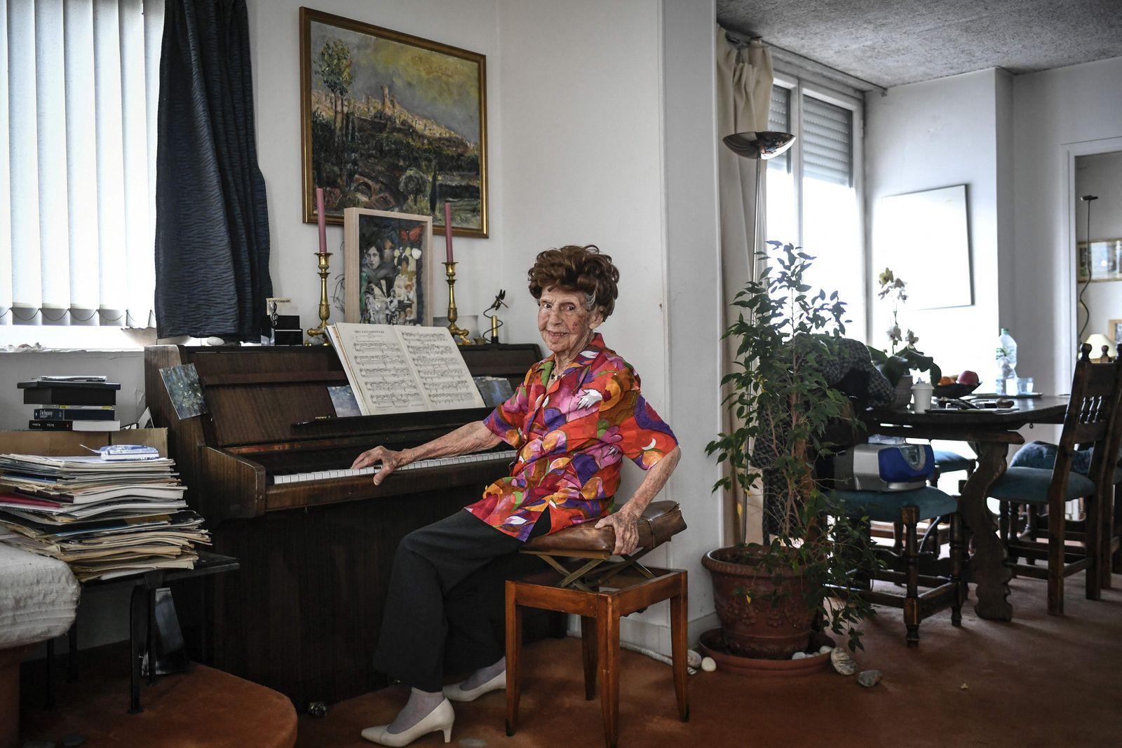 French pianist Colette Maze, 108 years-old, poses during a photo session in Paris on March 24, 2023. (Photo by STEPHANE DE SAKUTIN / AFP) - AFP