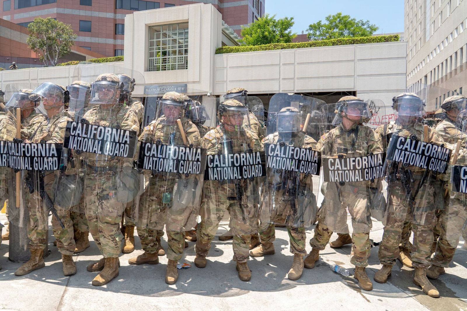 National Guard soldiers outside the Edward R. Roybal Federal Building during a demonstration in Los Angeles, California, US, on Sunday, June 8, 2025. Tensions flared during a demonstration in Los Angeles on the third day of anti-deportation protests, as demonstrators clashed with law enforcement while President�Donald Trump�and California Governor�Gavin Newsom�exchanged blame over the unrest and responsibility for restoring order. Photographer: Kyle Grillot/Bloomberg