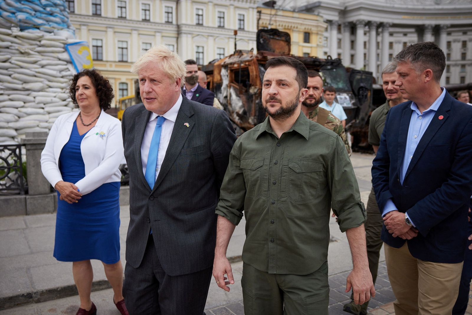 British PM Johnson and Ukraine's President Zelenskiy walk at Mykhailivska Square in Kyiv - via REUTERS