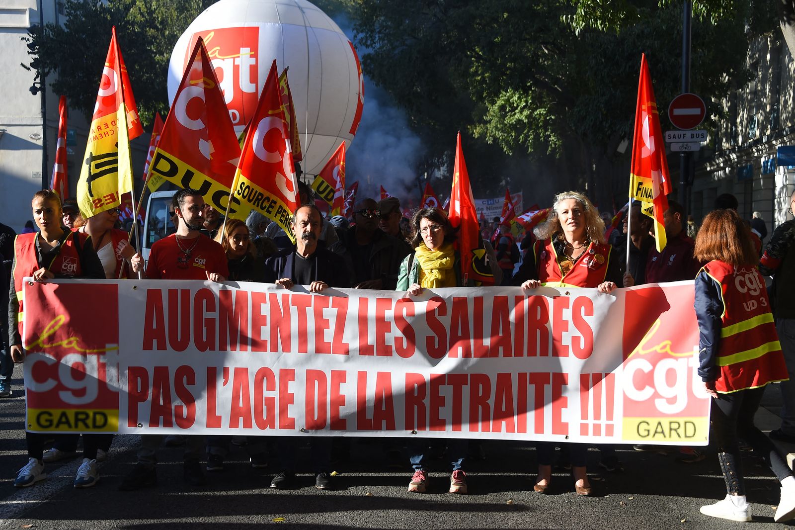 CGT union leader Philippe Martinez (C) takes part in a demonstration as part of a nationwide strike during a national and interprofessional mobilisation day called by the CGT union, in Nimes, southern France, on November 10, 2022. (Photo by Sylvain THOMAS / AFP) - AFP