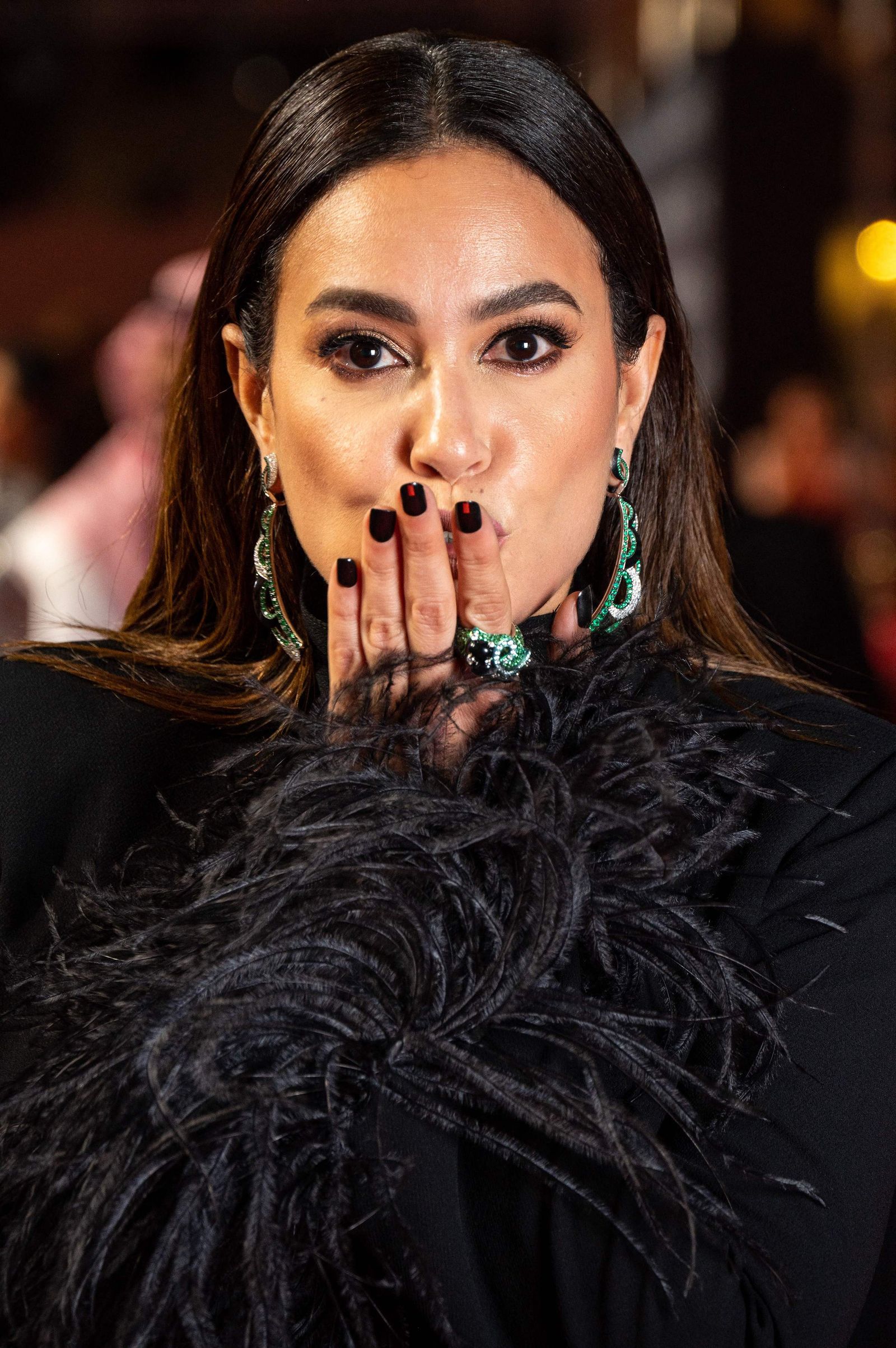 A handout picture released by the Red Sea Festival shows Tunisian actress Hend Sabry posing for a picture prior to the closing ceremony of the first edition of the Red Sea Film Festival in Saudi Arabia's Red Sea coastal city of Jeddah on December 13, 2021. (Photo by Ammar ABD RABBO / Red Sea Film Festival / AFP) / RESTRICTED TO EDITORIAL USE - MANDATORY CREDIT 