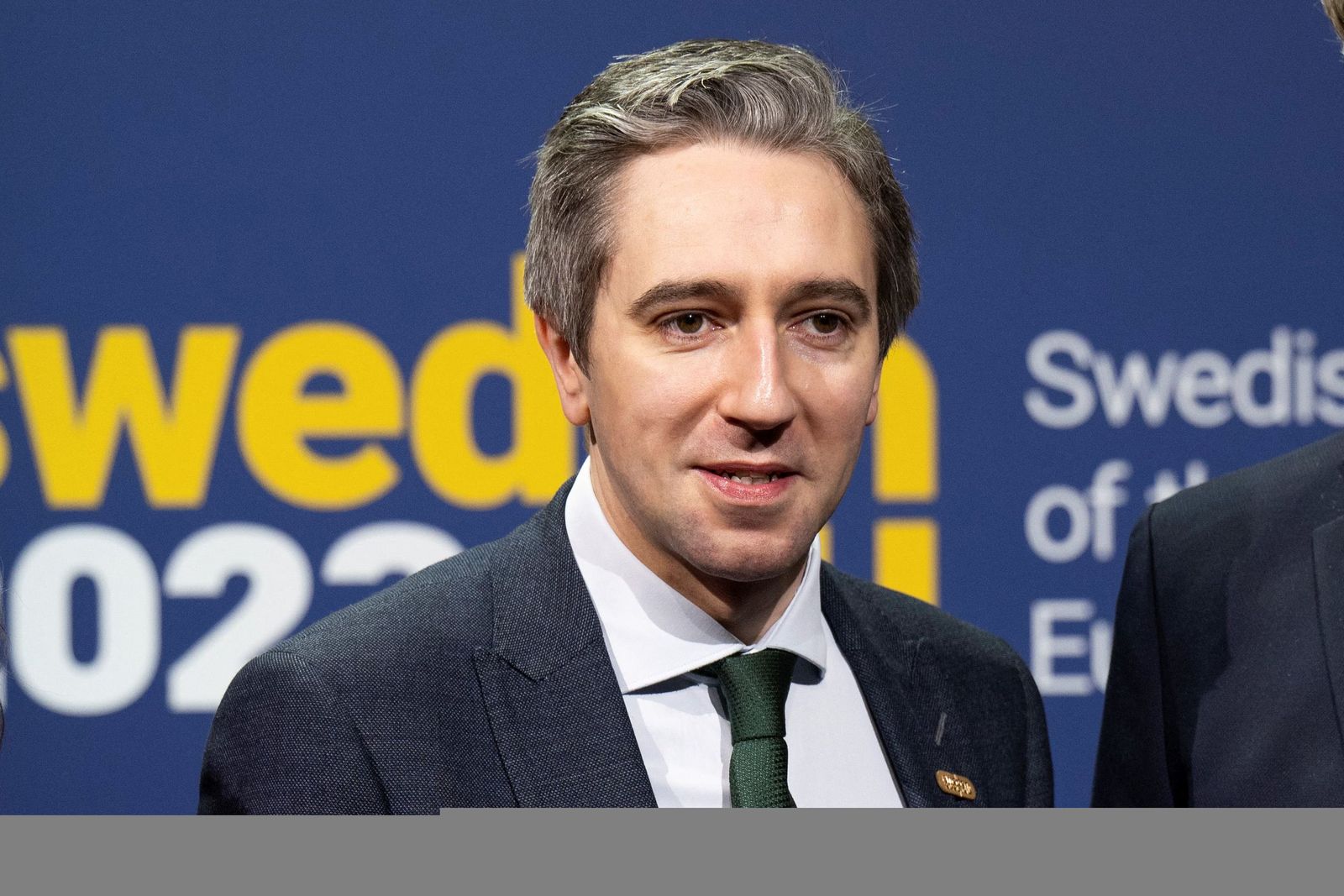 (Files) Ireland's Minister for Justice Simon Harris poses for a photograph as he arrives for the first informal ministerial meeting in Stockholm, Sweden, on January 26, 2023. Simon Harris, set to become Ireland's youngest ever Taoiseach (prime minister), will hope his social media skills and fresh face can save his party's flagging fortunes as elections loom. Already dubbed by media the 'TikTok Taoiseach' (pronounced 'Tee-shock') the 37-year-old beats the previous record holder, predecessor Leo Varadkar, who was 38 when he took the top job in 2017. (Photo by Pontus LUNDAHL / TT News Agency / AFP) / - Sweden OUT / SWEDEN OUT