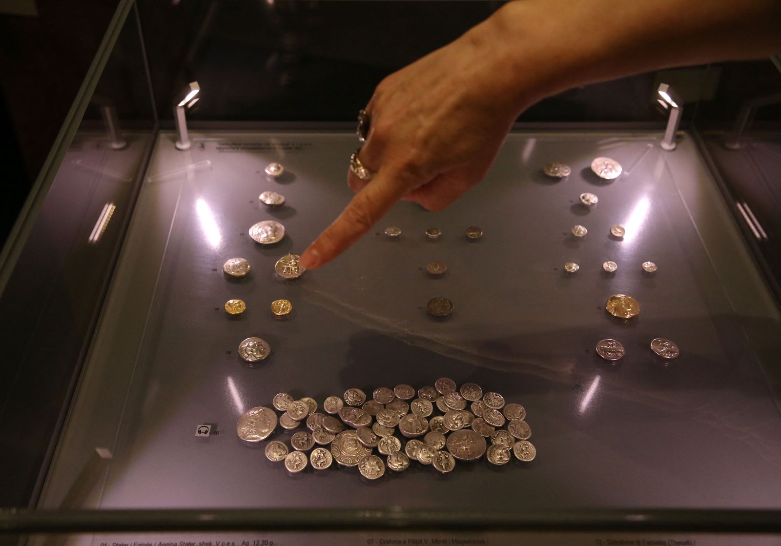This picture taken on June 13, 2022, shows silver coins found in 1982 at 