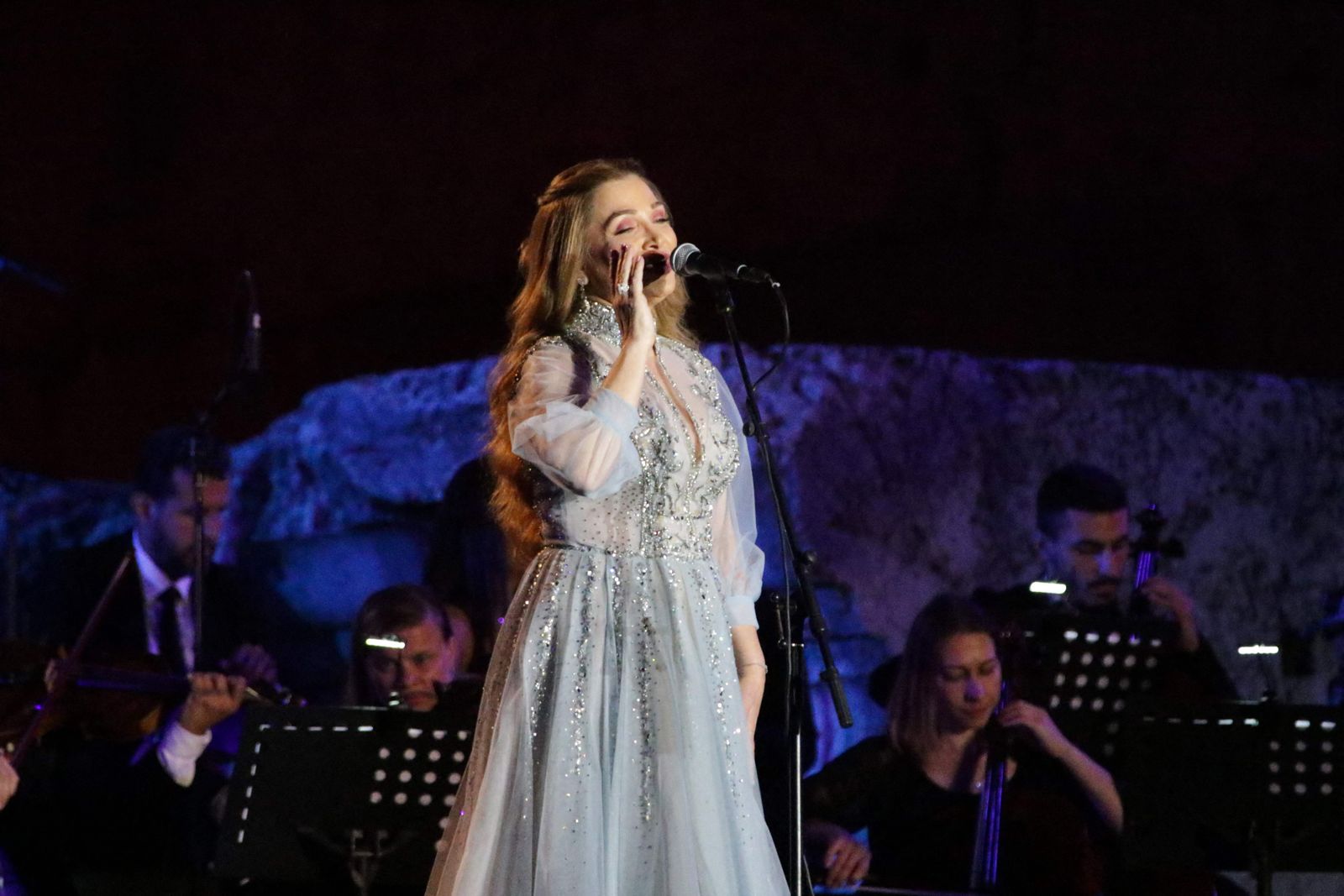 Lebanese singer Soumaya Baalbaki performs on the opening night of the Baalbek festival in the Roman ruins of the eponymous ancient city in Lebanon's Bekaa valley, on July 8, 2022. (Photo by AFP) - AFP