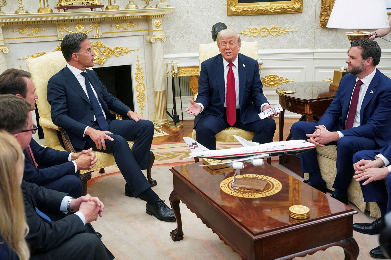U.S. President Donald Trump and Vice President JD Vance meet with NATO Secretary General Mark Rutte, where President Trump announces a deal to send U.S. weapons to Ukraine through NATO, in the Oval Office at the White House in Washington, D.C., U.S., July 14, 2025. REUTERS/Nathan Howard