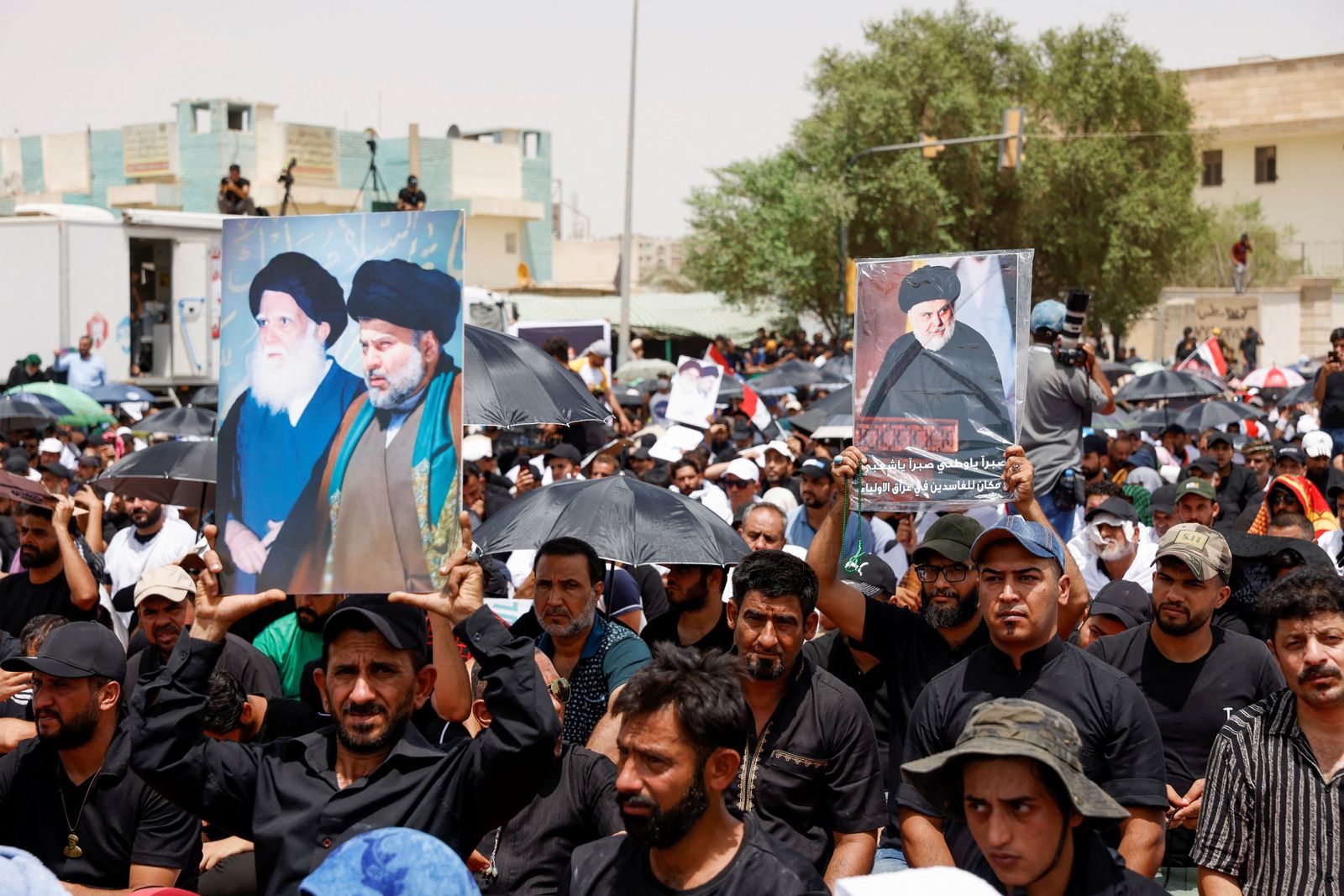 Supporters of Iraqi populist leader Moqtada al-Sadr gather for mass Friday prayer, in Baghdad - REUTERS